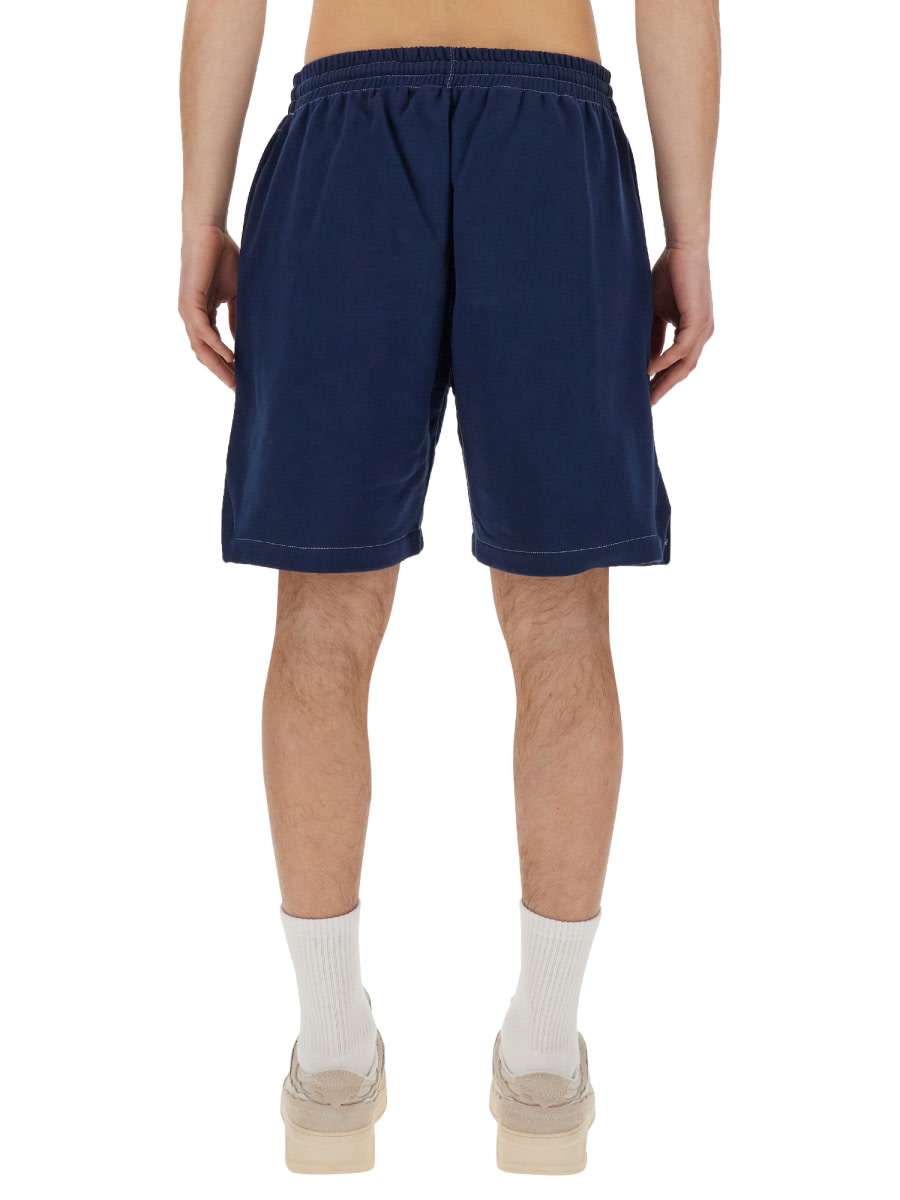 Shop Msgm Bermuda Shorts With Embroidered Logo In Blue