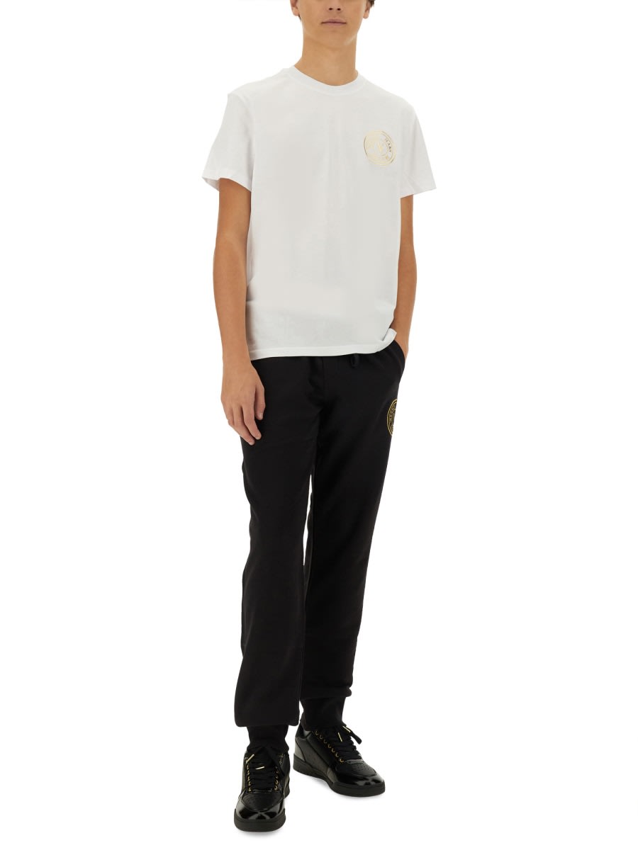 Shop Versace Jeans Couture V-emblem T-shirt In White