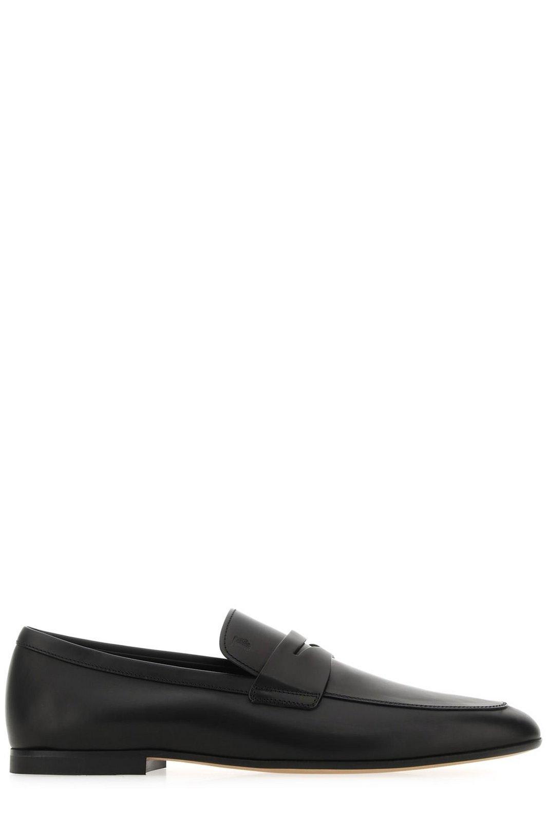 Shop Tod's Logo-embossed Slip-on Loafers Tods In Black