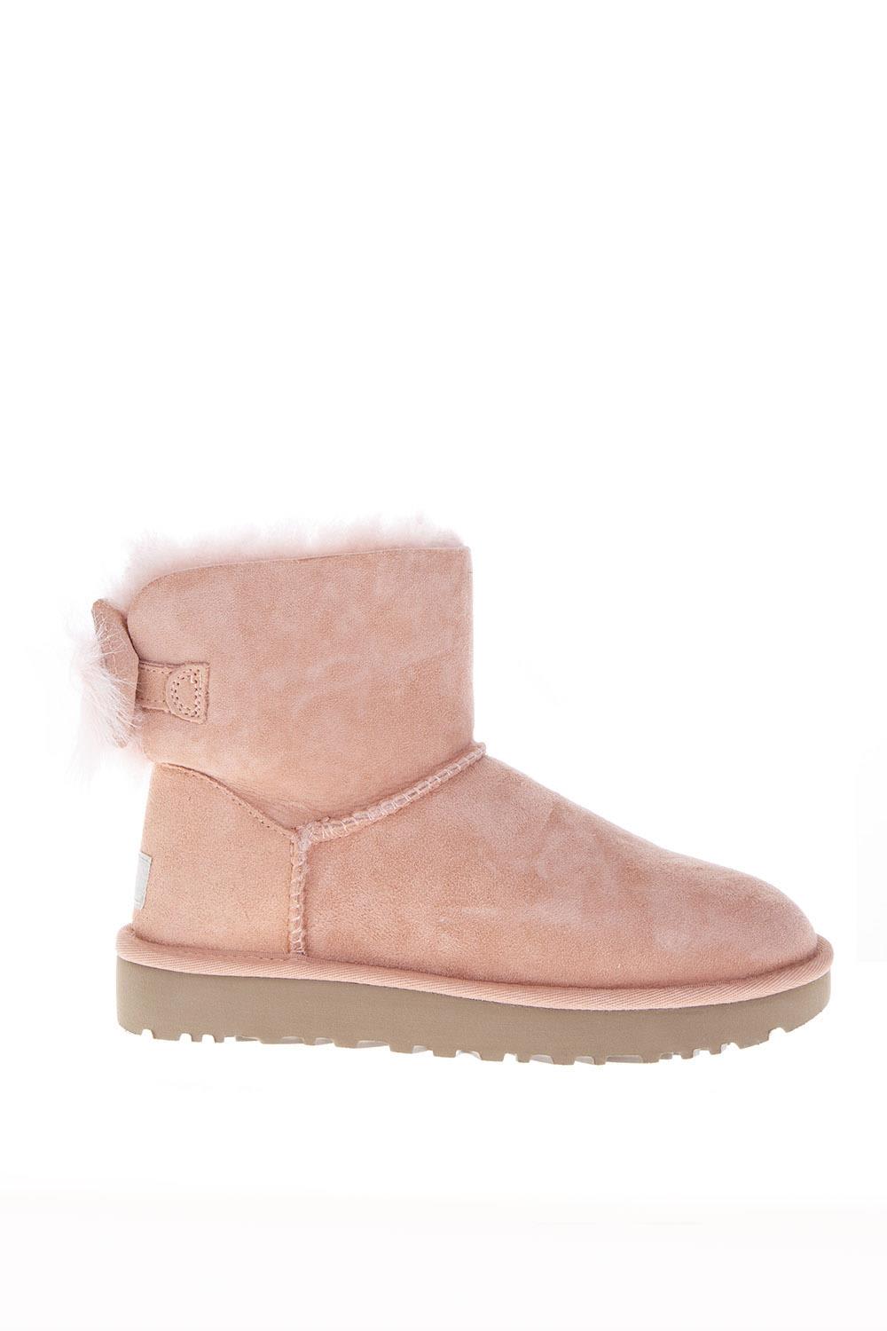 Buy UGG Fluff Pink Mini Boots online, shop UGG shoes with free shipping