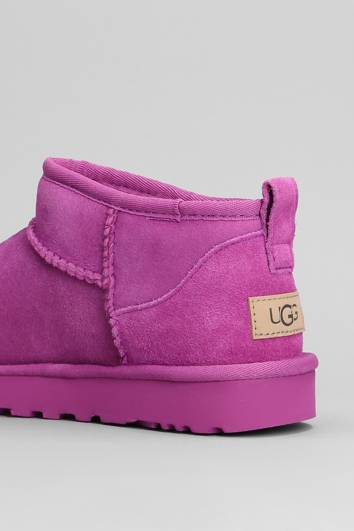 Shop Ugg Classic Ultra Mini Low Heels Ankle Boots In Fuxia Suede