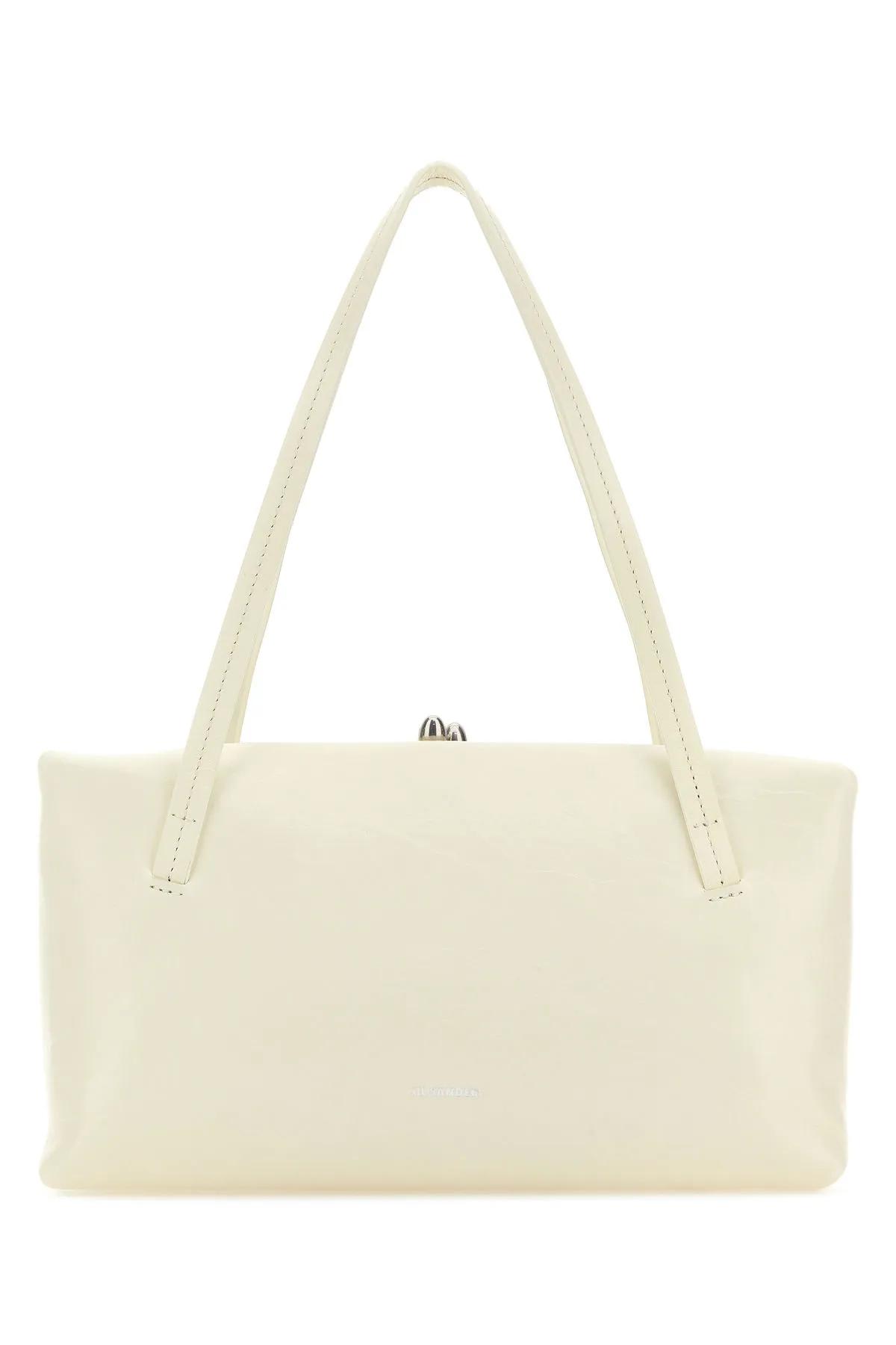 Shop Jil Sander Ivory Leather Goji Pillow Handbag In White