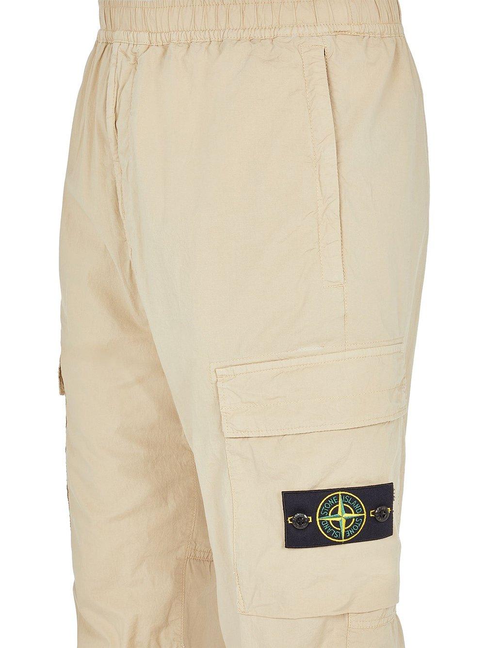Shop Stone Island Logo Patch Cargo Pants In Beige