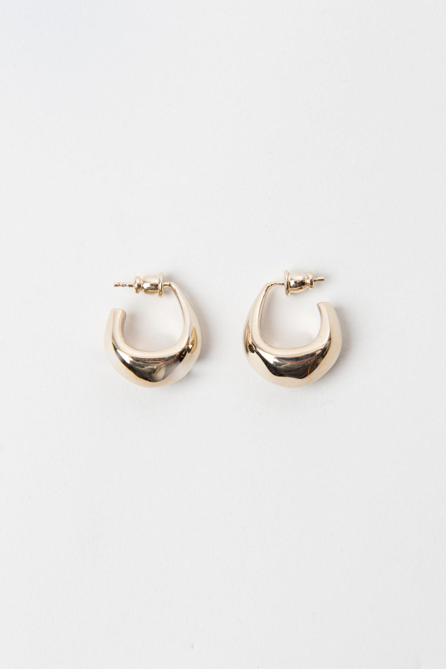 Lemaire Curved Mini Drop Earrings In Light Gold | ModeSens