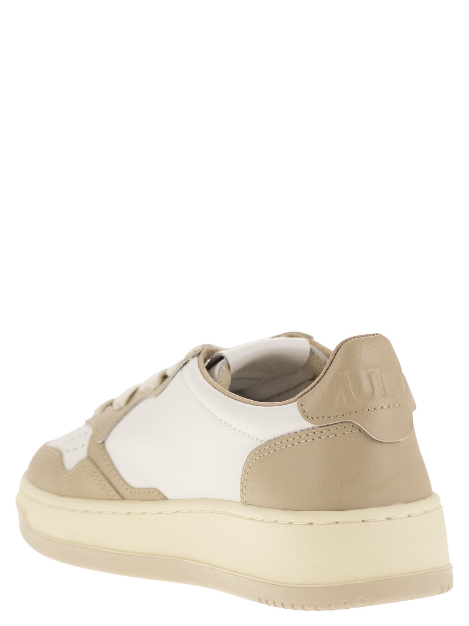 Shop Autry Medalist Low - Two-tone Leather Sneakers In White/beige