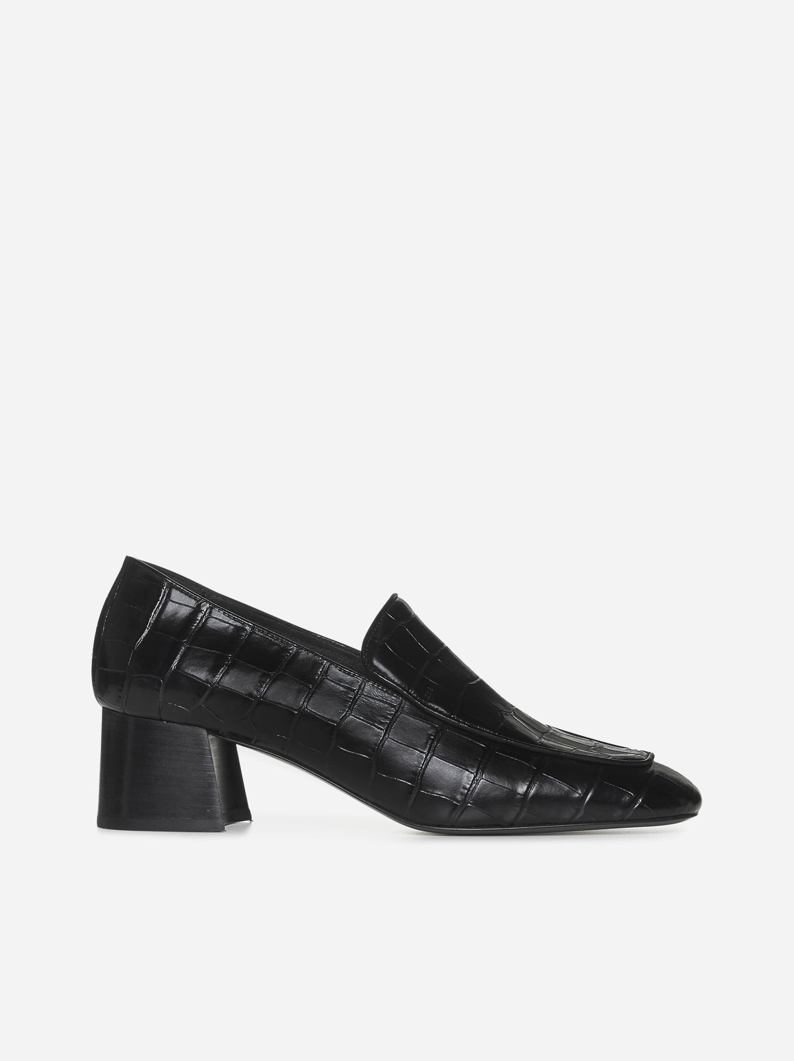 Shop Totême Animalier Embossed Leather Loafers In Black