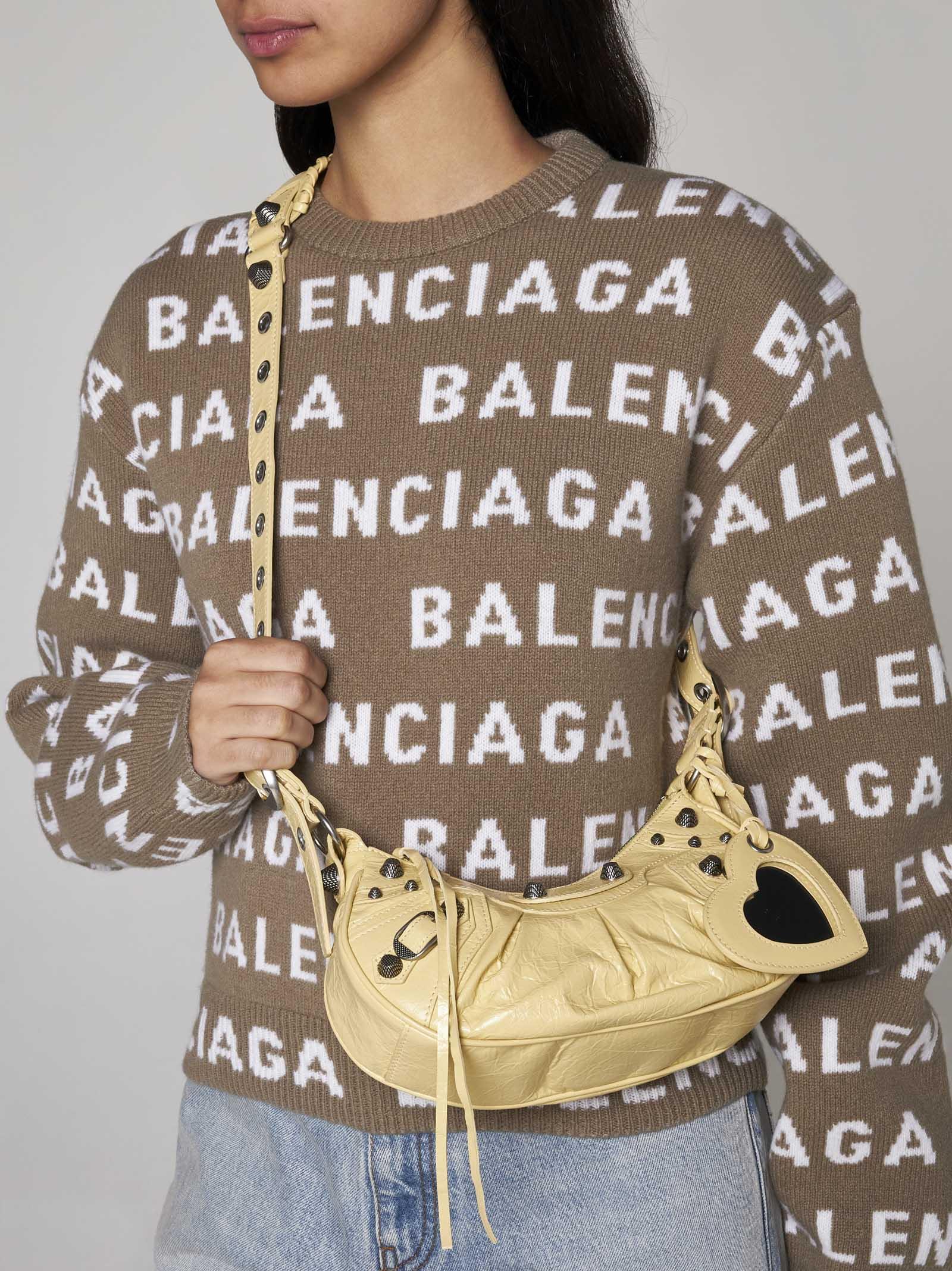 Shop Balenciaga Le Cagole Xs Leather Bag In Yellow