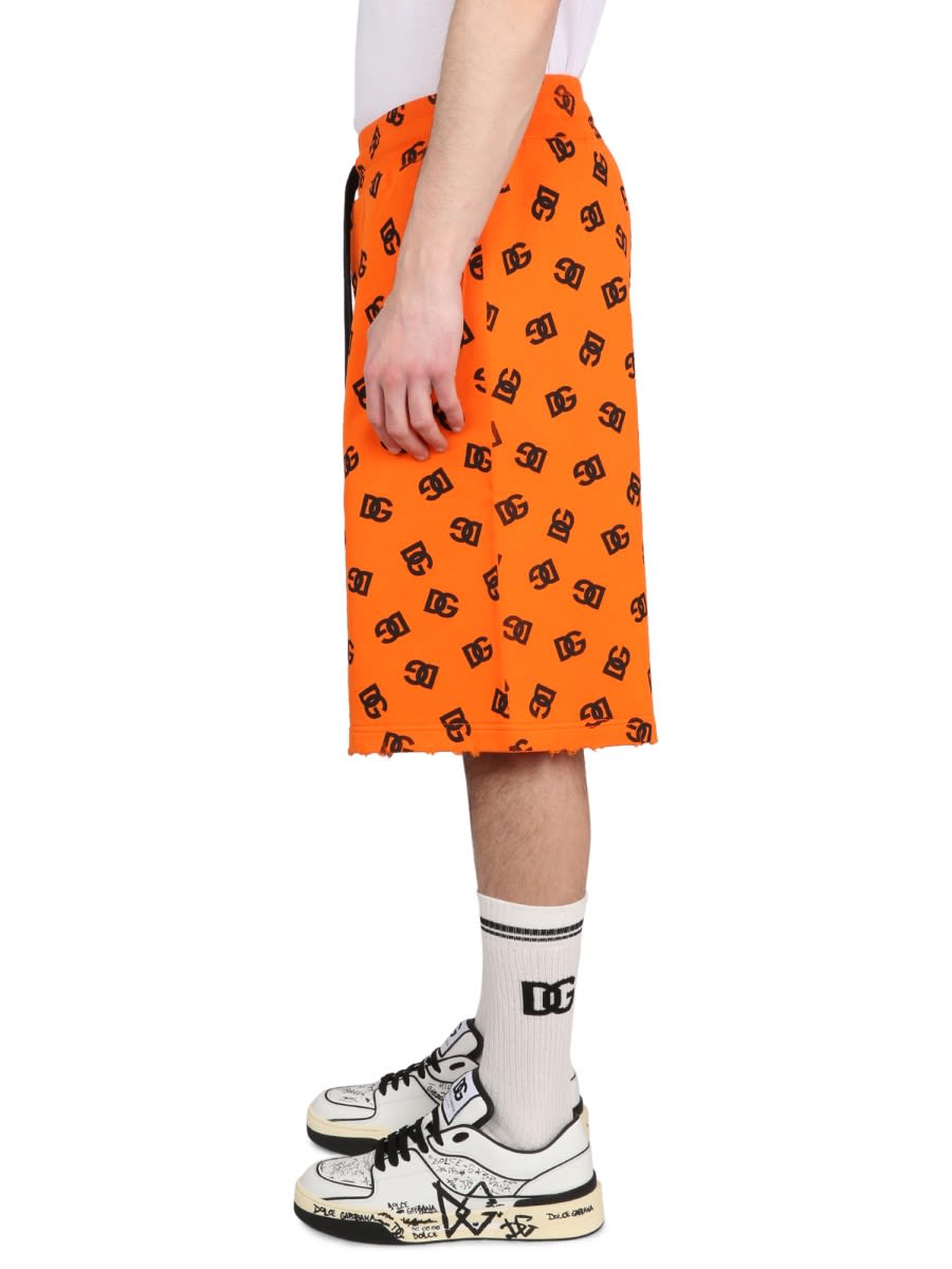 Dolce & Gabbana Logo Waist Drawstring Knee-length Bermuda Shorts In Orange
