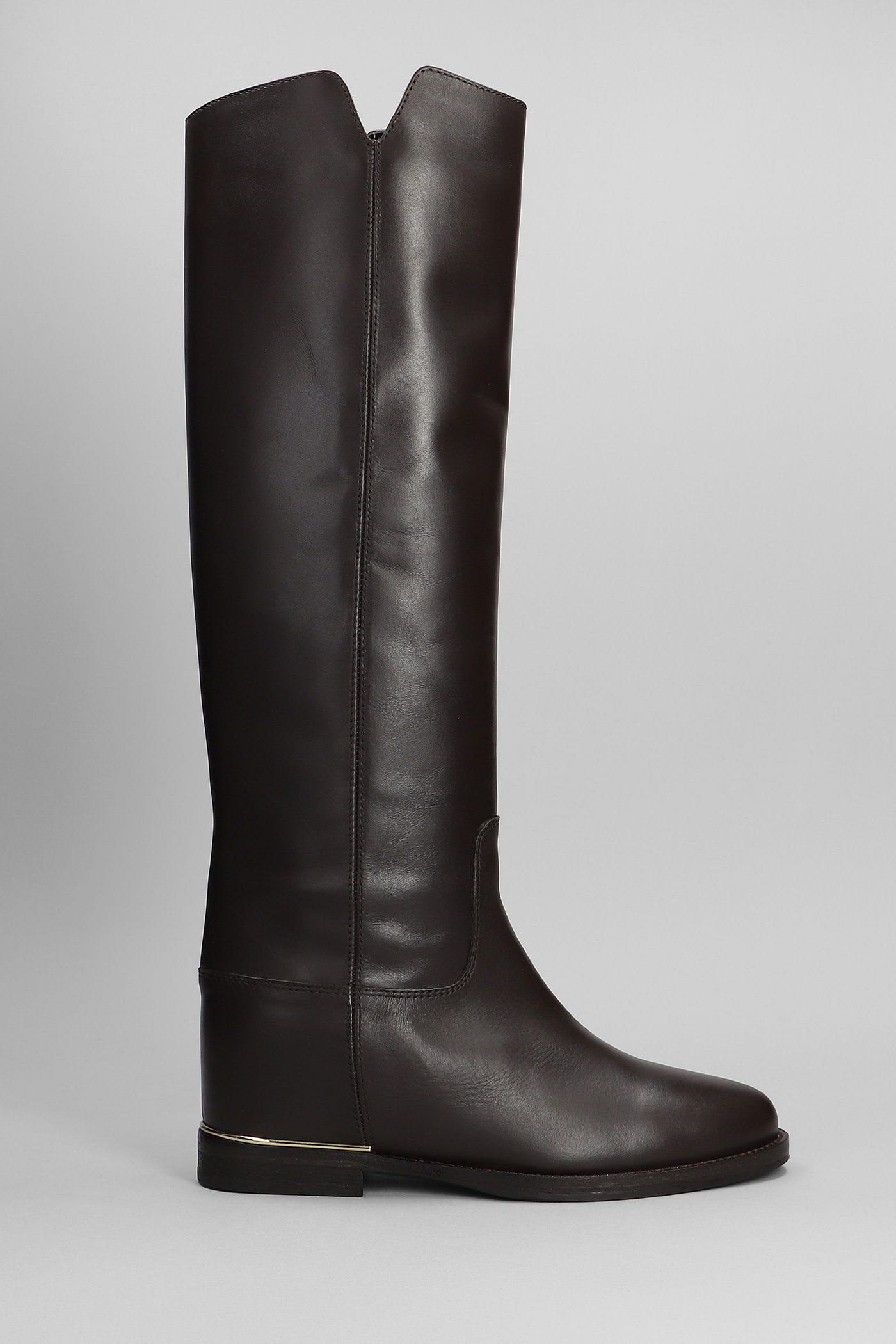 In Dark Brown Leather