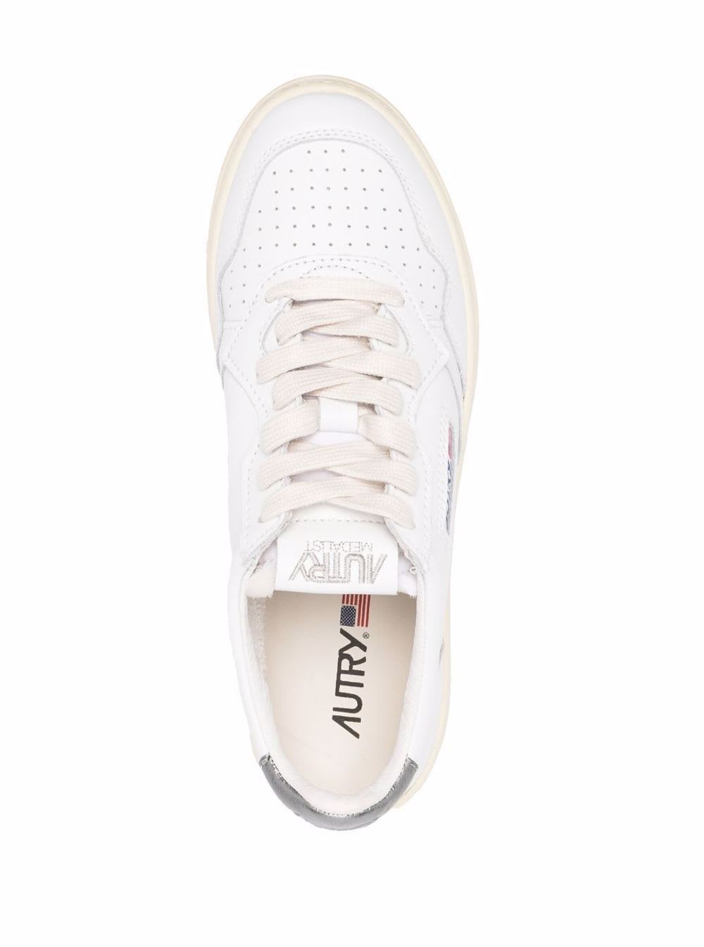 Shop Autry White And Silver Leather Sneakers  Woman