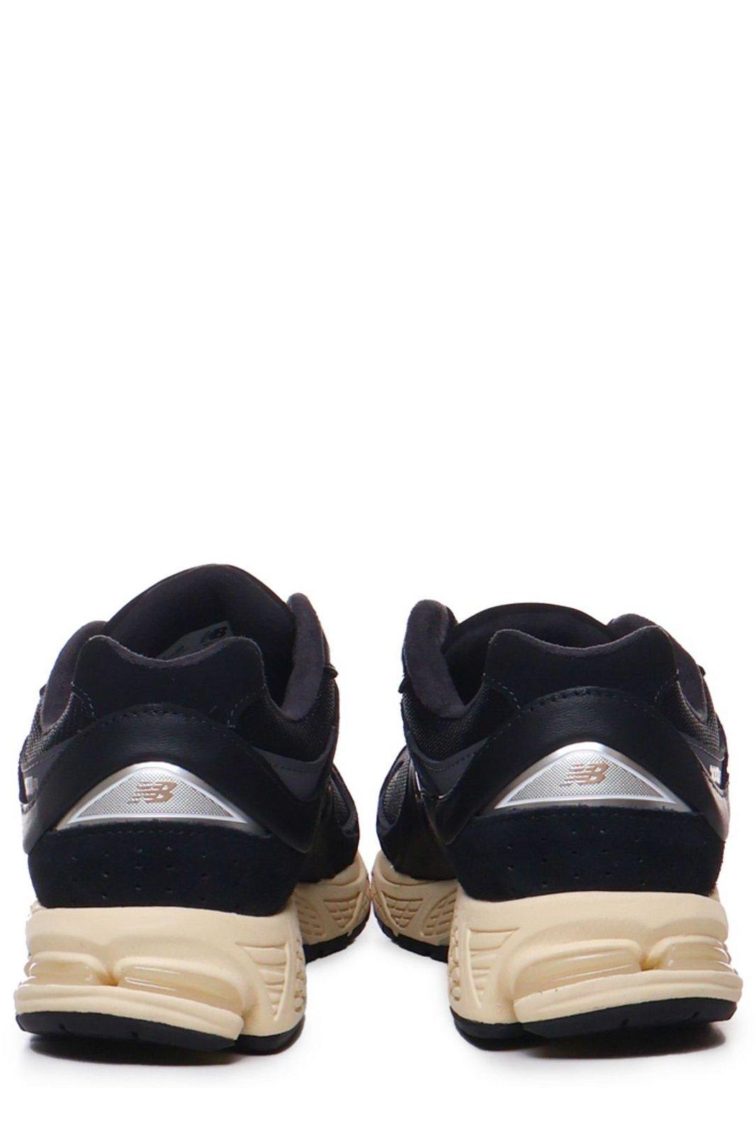 Shop New Balance M2002r Logo Patch Sneakers In Black