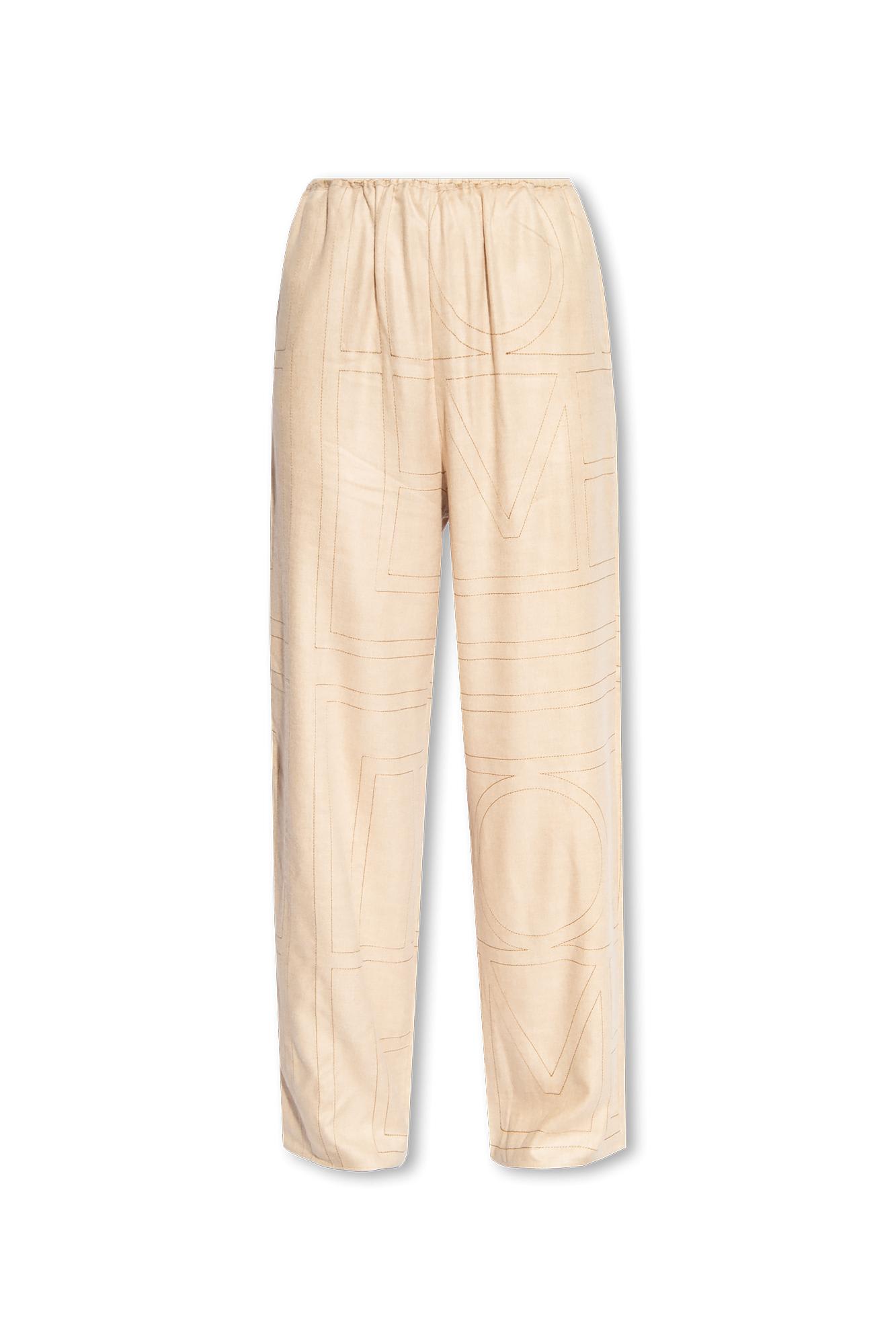 Shop Totême Toteme Trousers With Monogram In Ivory