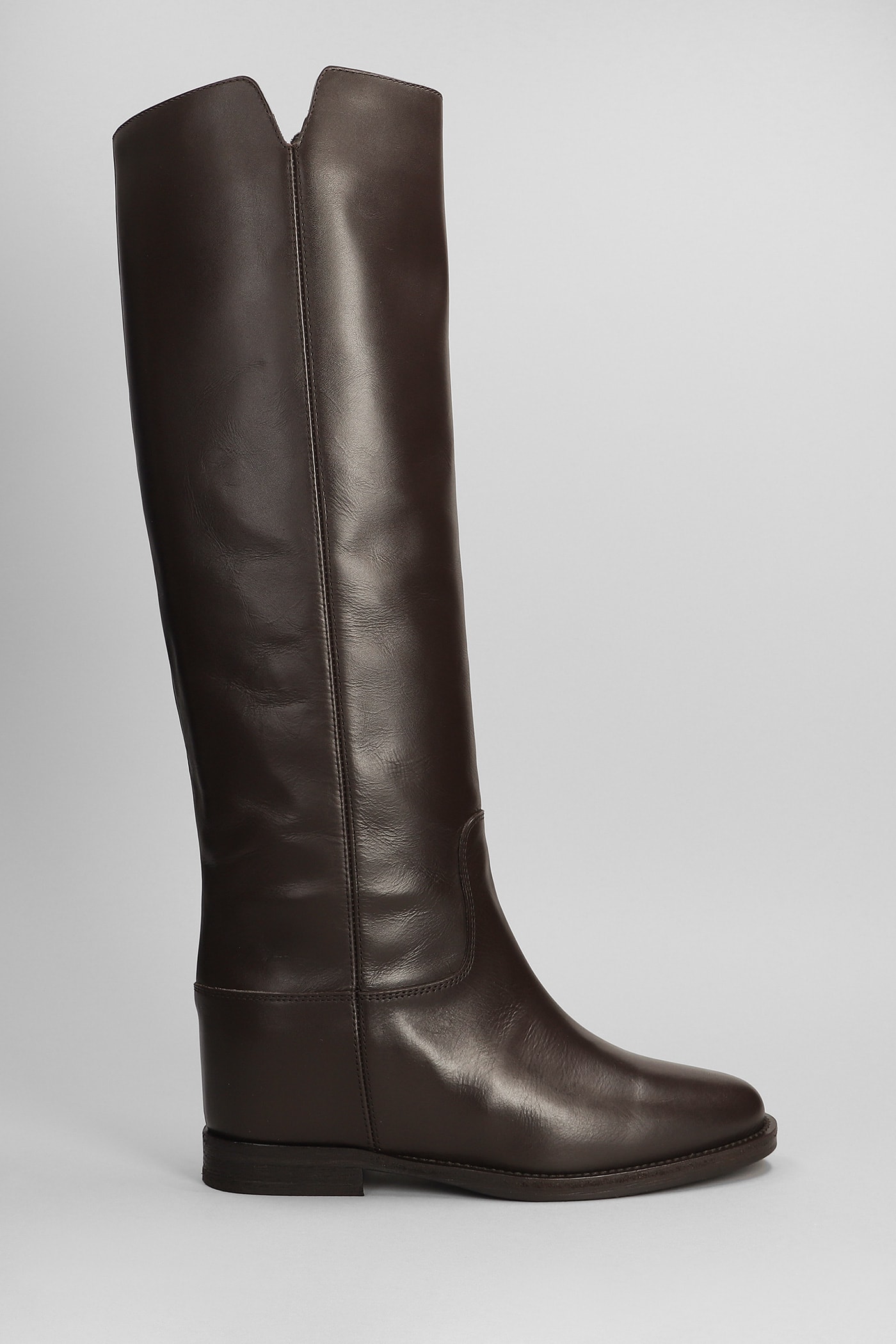 In Dark Brown Leather