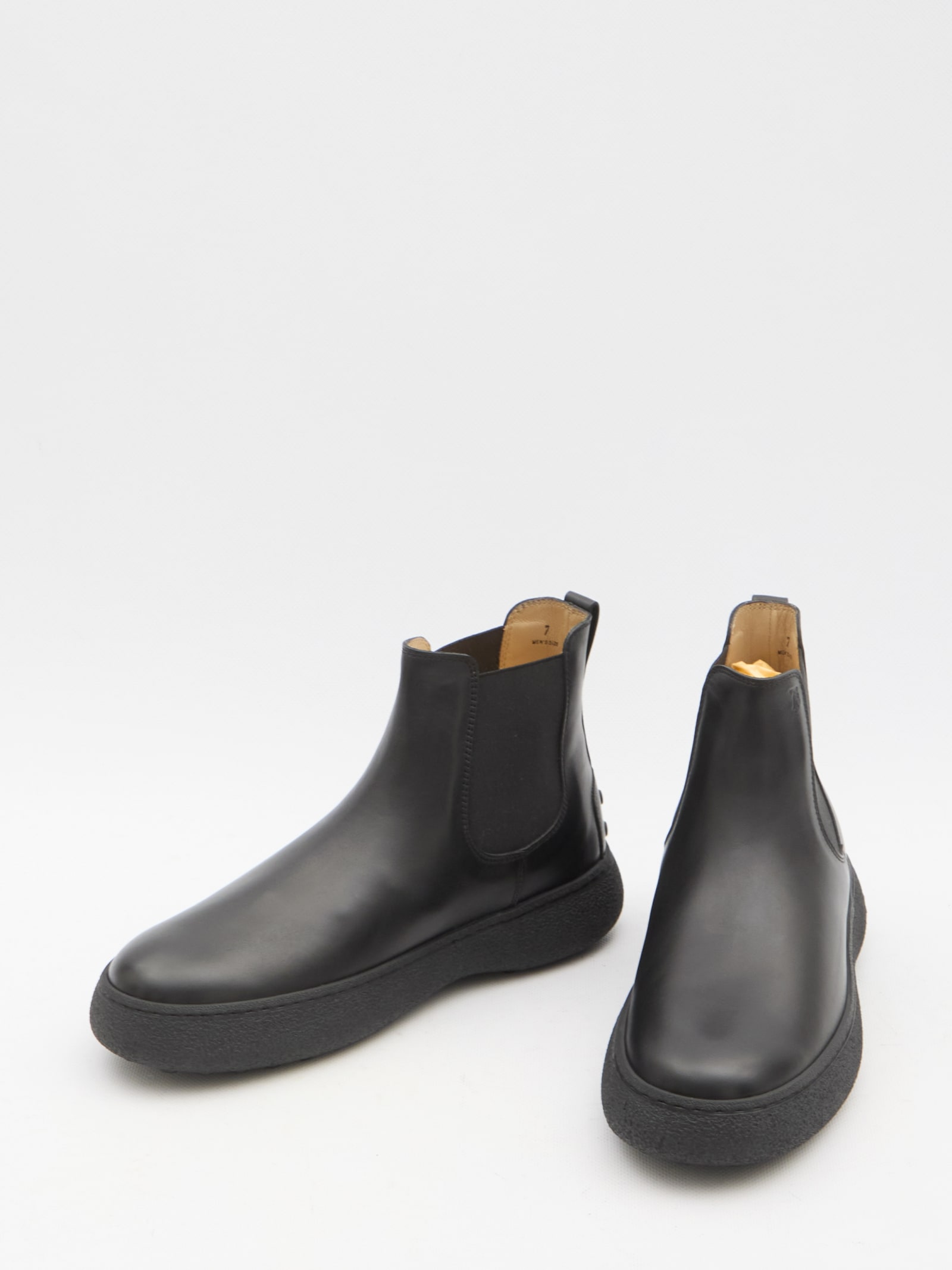 Shop Tod's Leather Chelsea Boots In Black