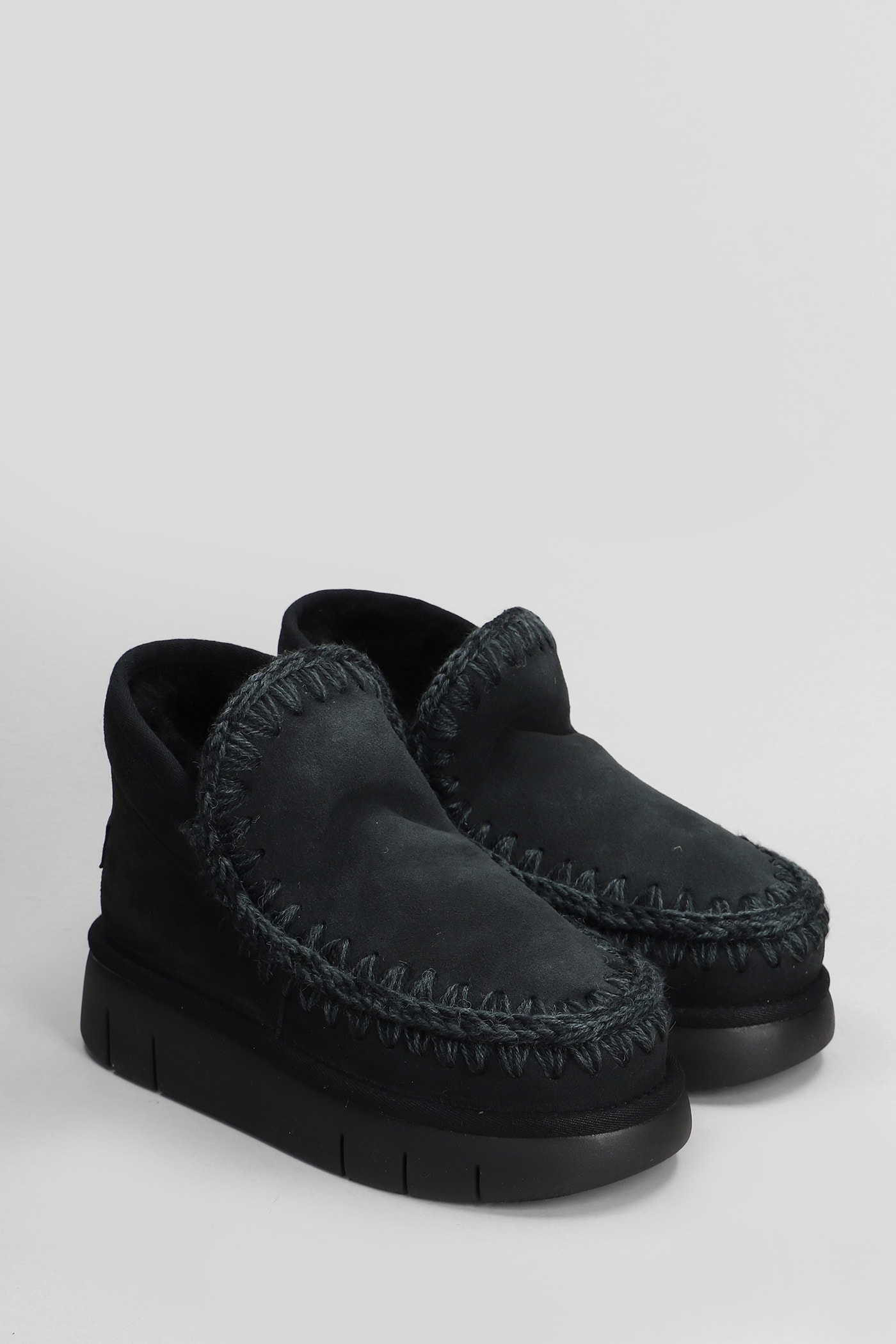 Shop Mou Eskimo Bounce Low Heels Ankle Boots In Black Suede