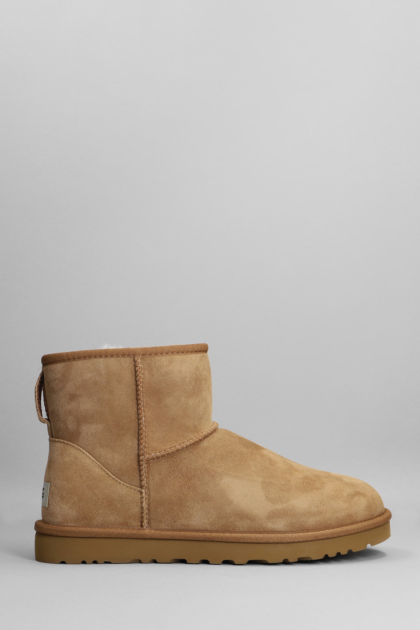 UGG Mini Classic Low Heels Ankle Boots In Leather Color Suede