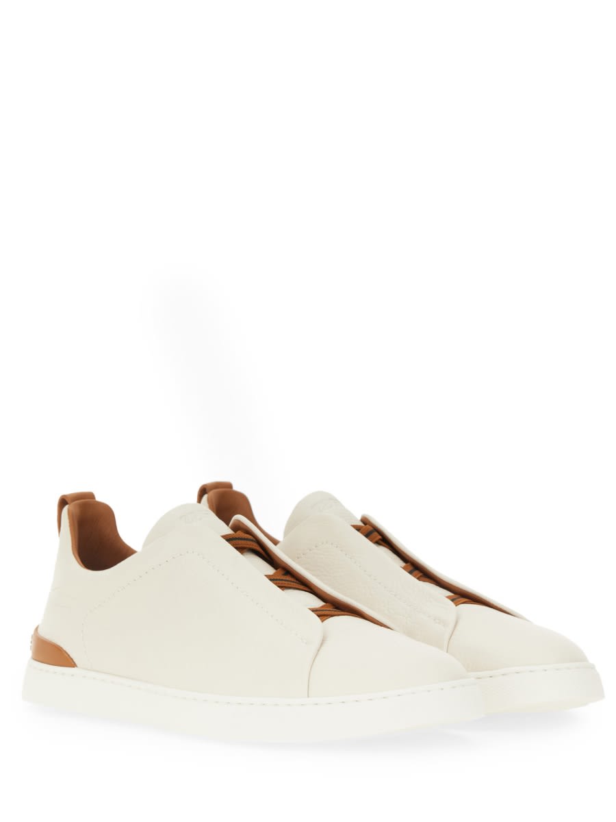 Shop Zegna Triple Stitch Sneaker In White