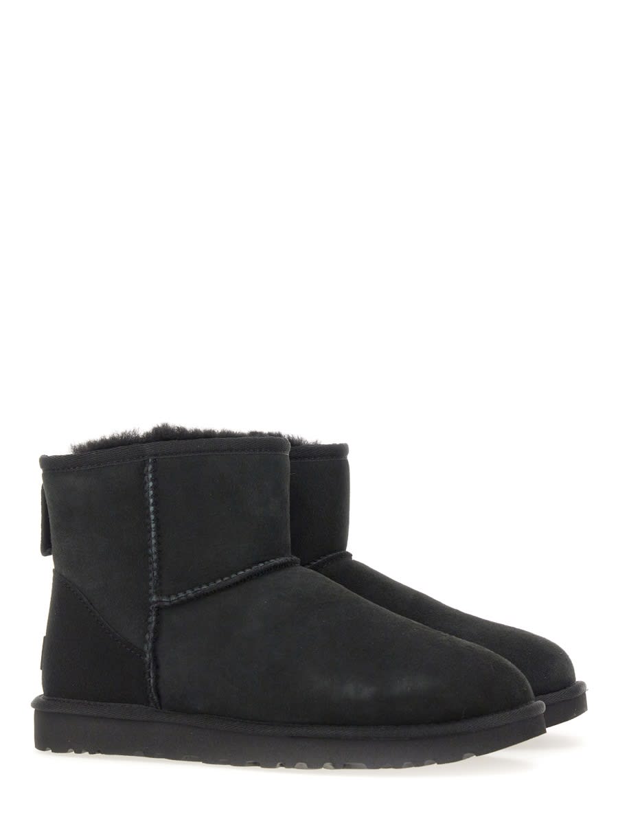 Shop Ugg Boot Mini Classic Ii In Black