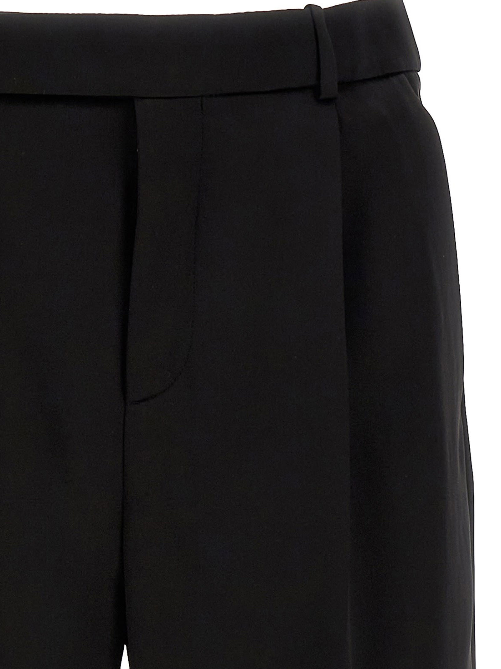 Shop Saint Laurent Flared Pants In Black