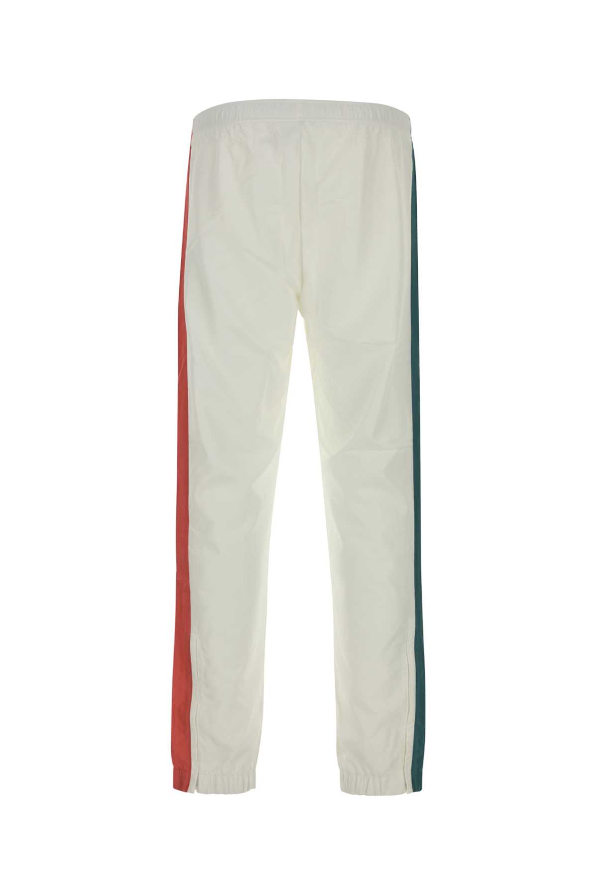 Lacoste Joggers With Printed Logo And Side Stripes In Isb