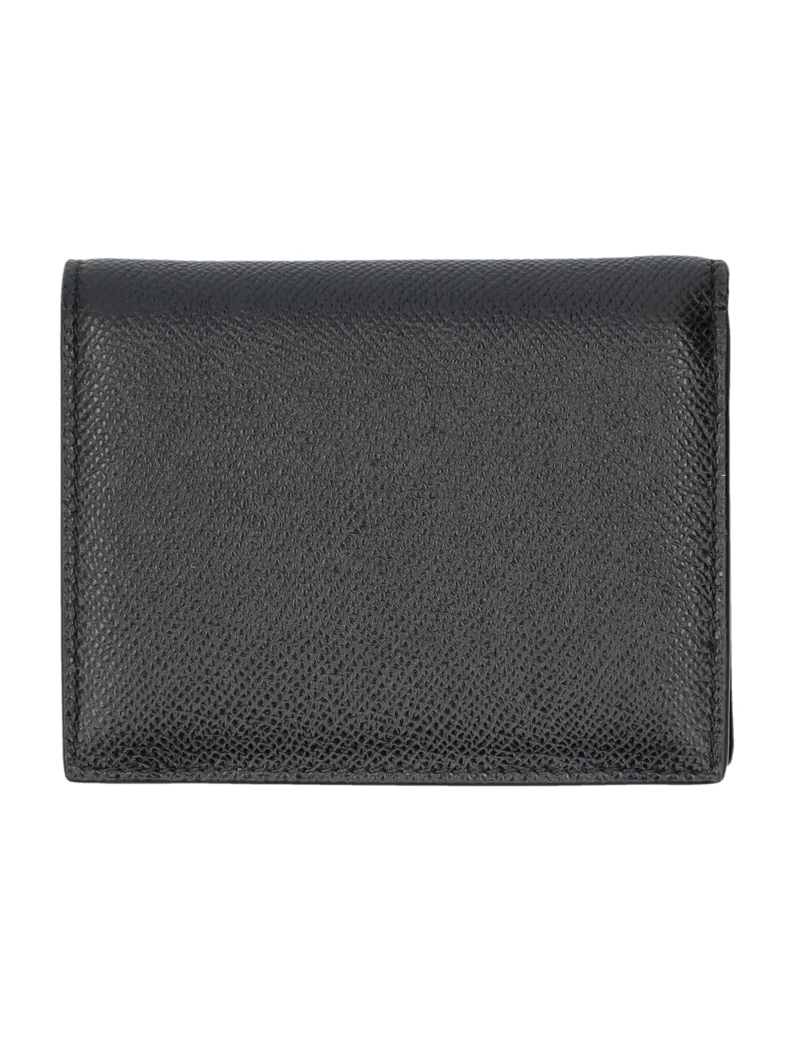 Shop Ferragamo Gancini Bifold Wallet In Black
