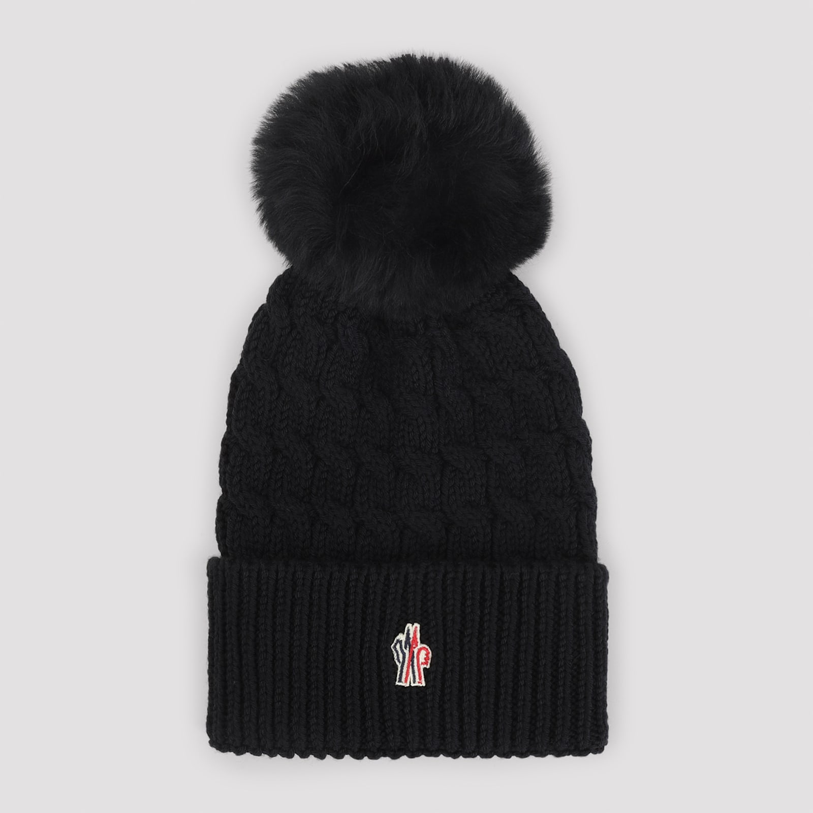 Moncler Wool Hat Featuring Cable Knit And Pom Detail In Black