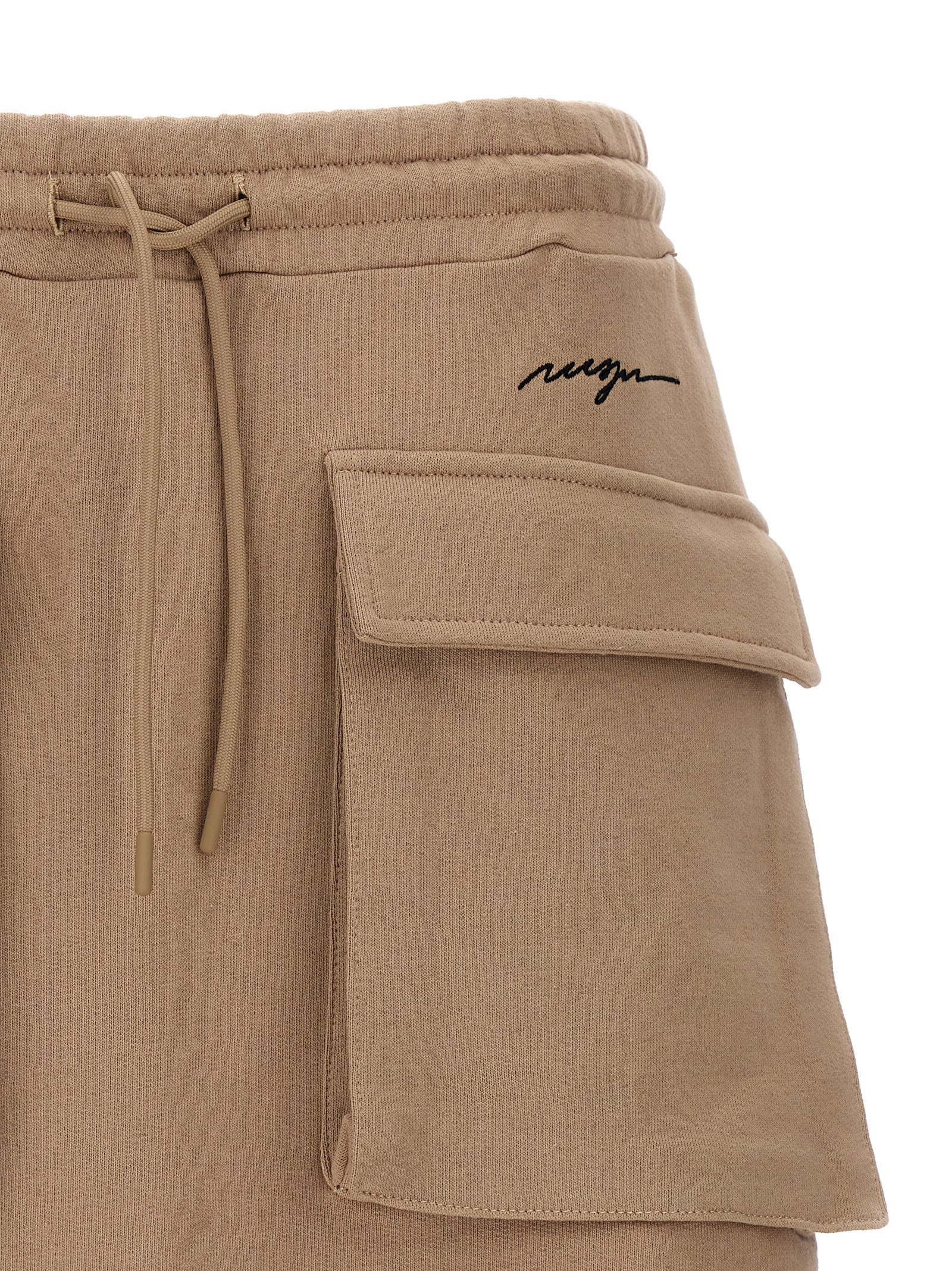 Shop Msgm Logo Embroidery Cargo Skirt In Beige