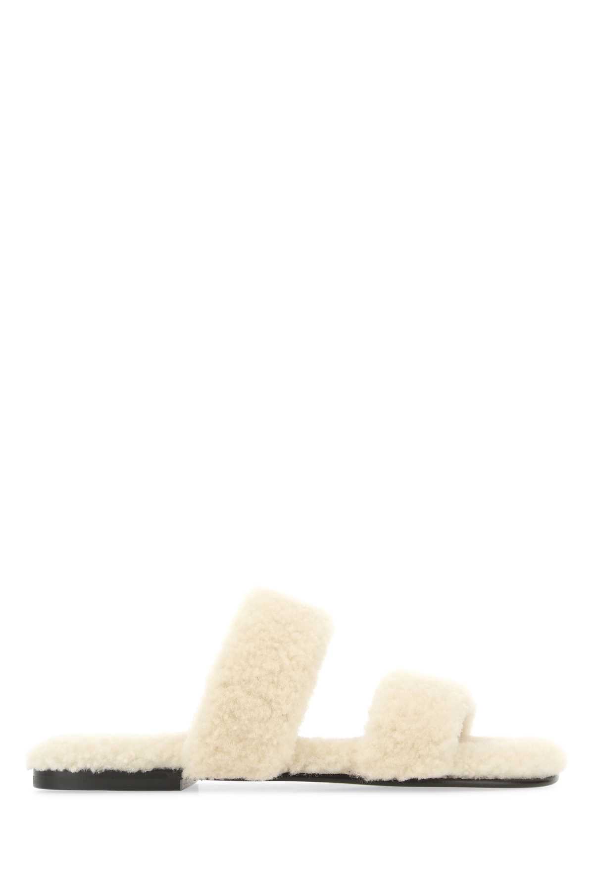 Shop Saint Laurent Ivory Shearling Bleach Slippers In 2634