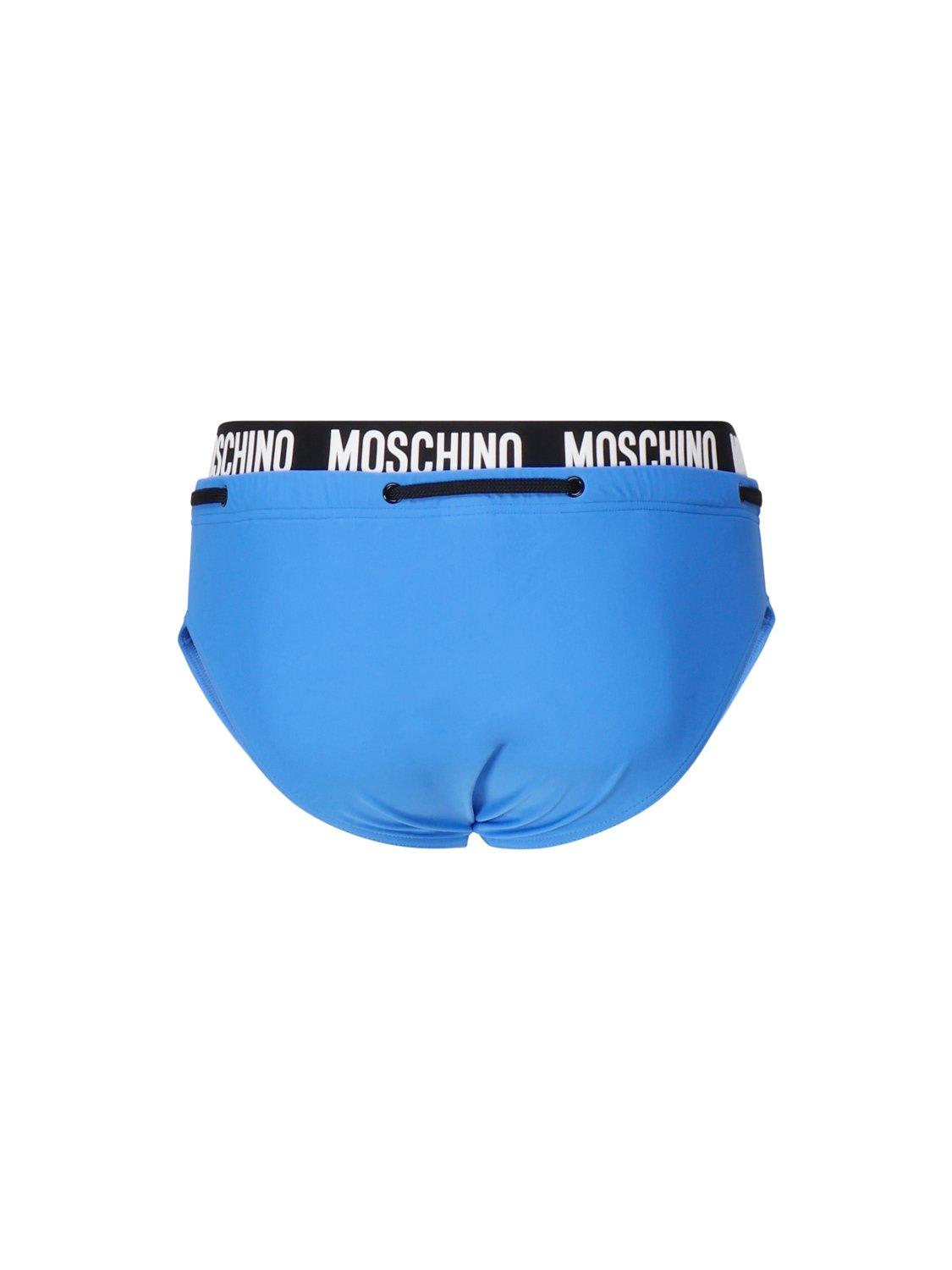 Shop Moschino Logo Waistband Drawstring Swim Briefs In Blue