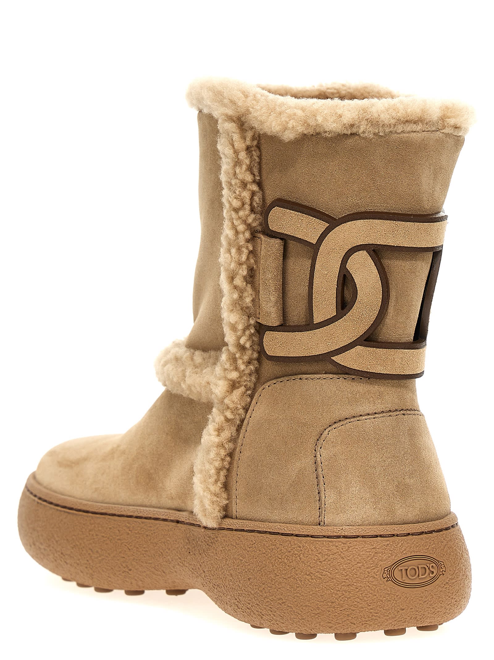 Shop Tod's Winter Gommini Boots In A Beige