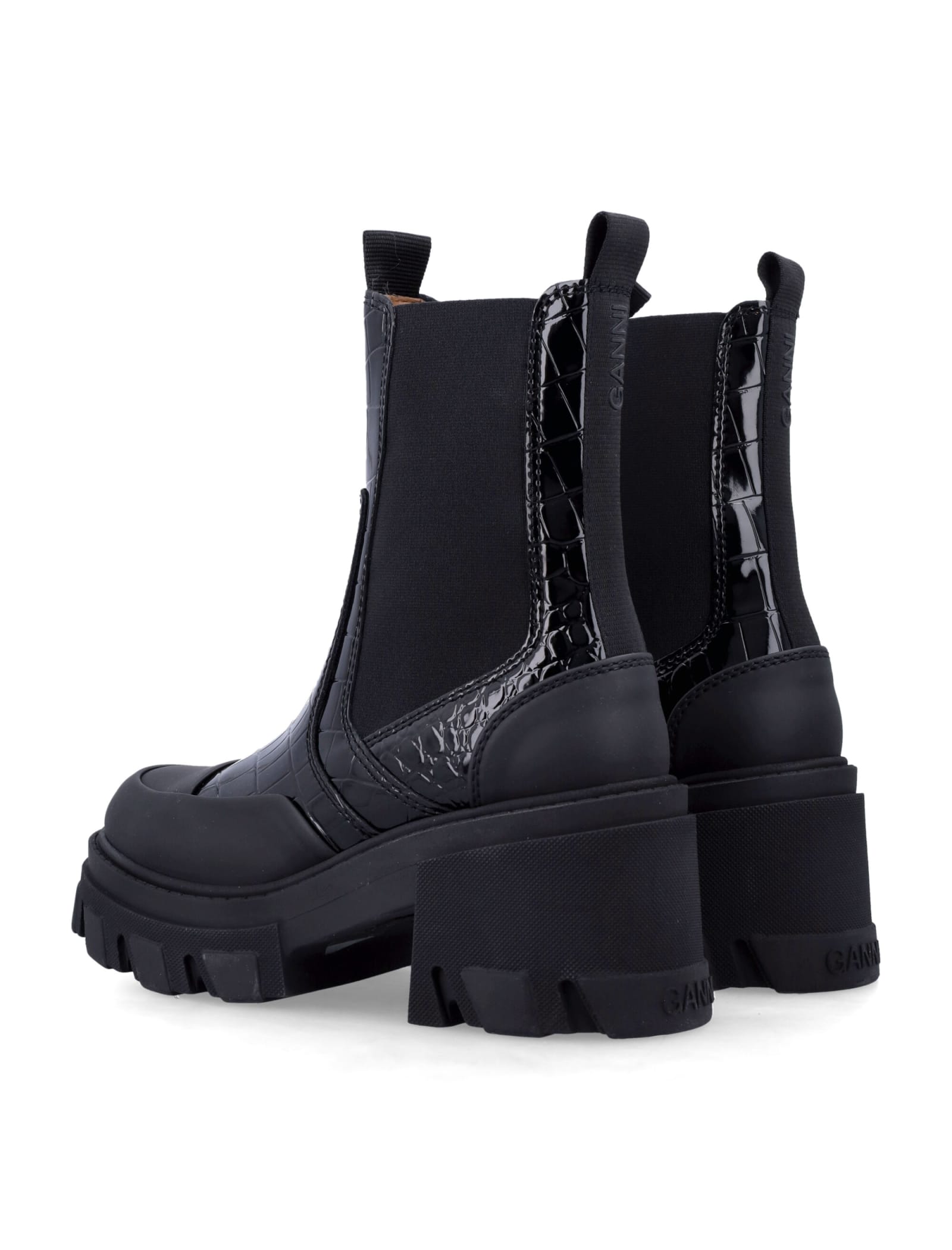 Shop Ganni Cleated Mid Boots In Black