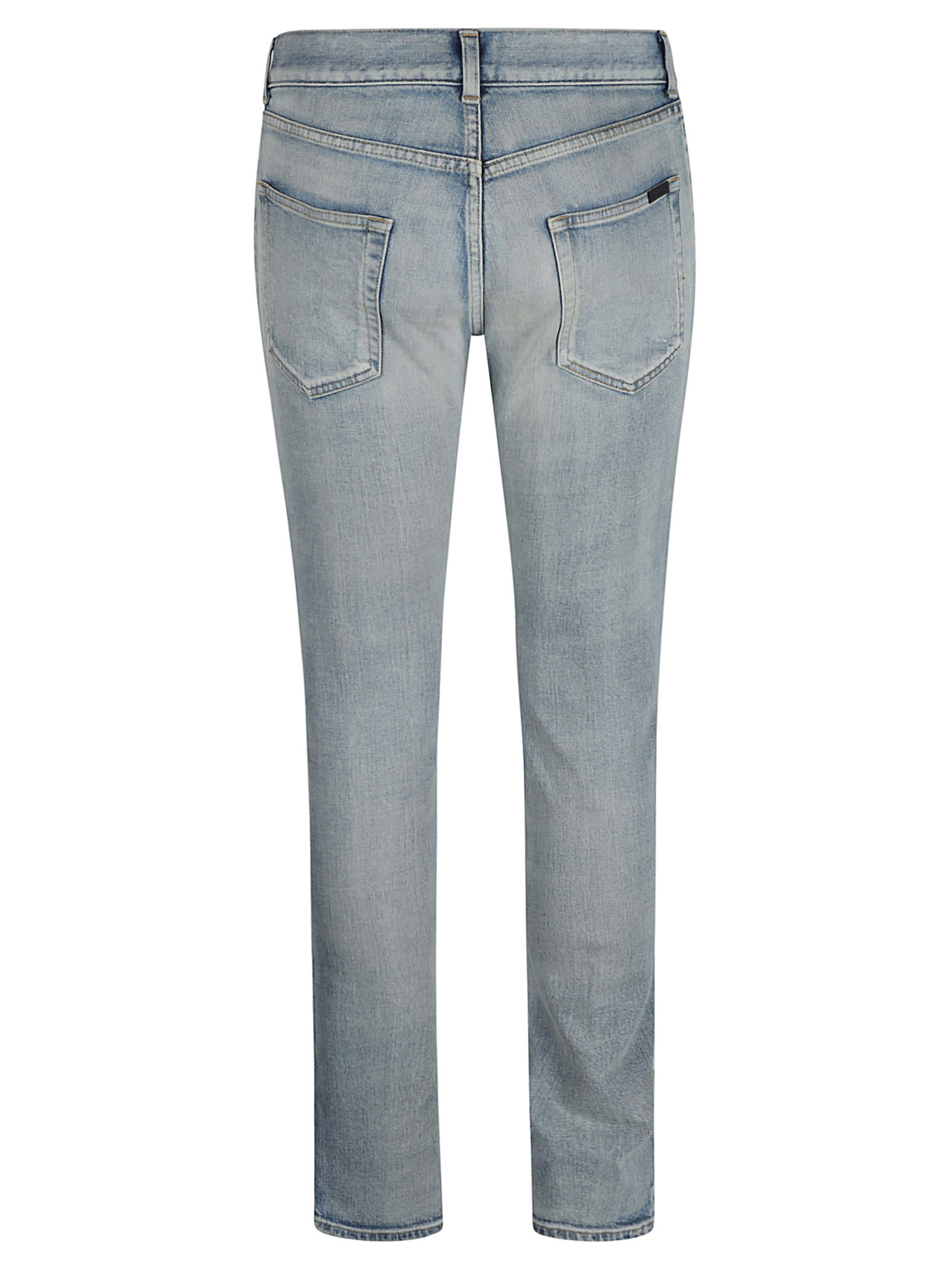 Shop Saint Laurent Rip Detail Fitted Jeans In Monica Blue