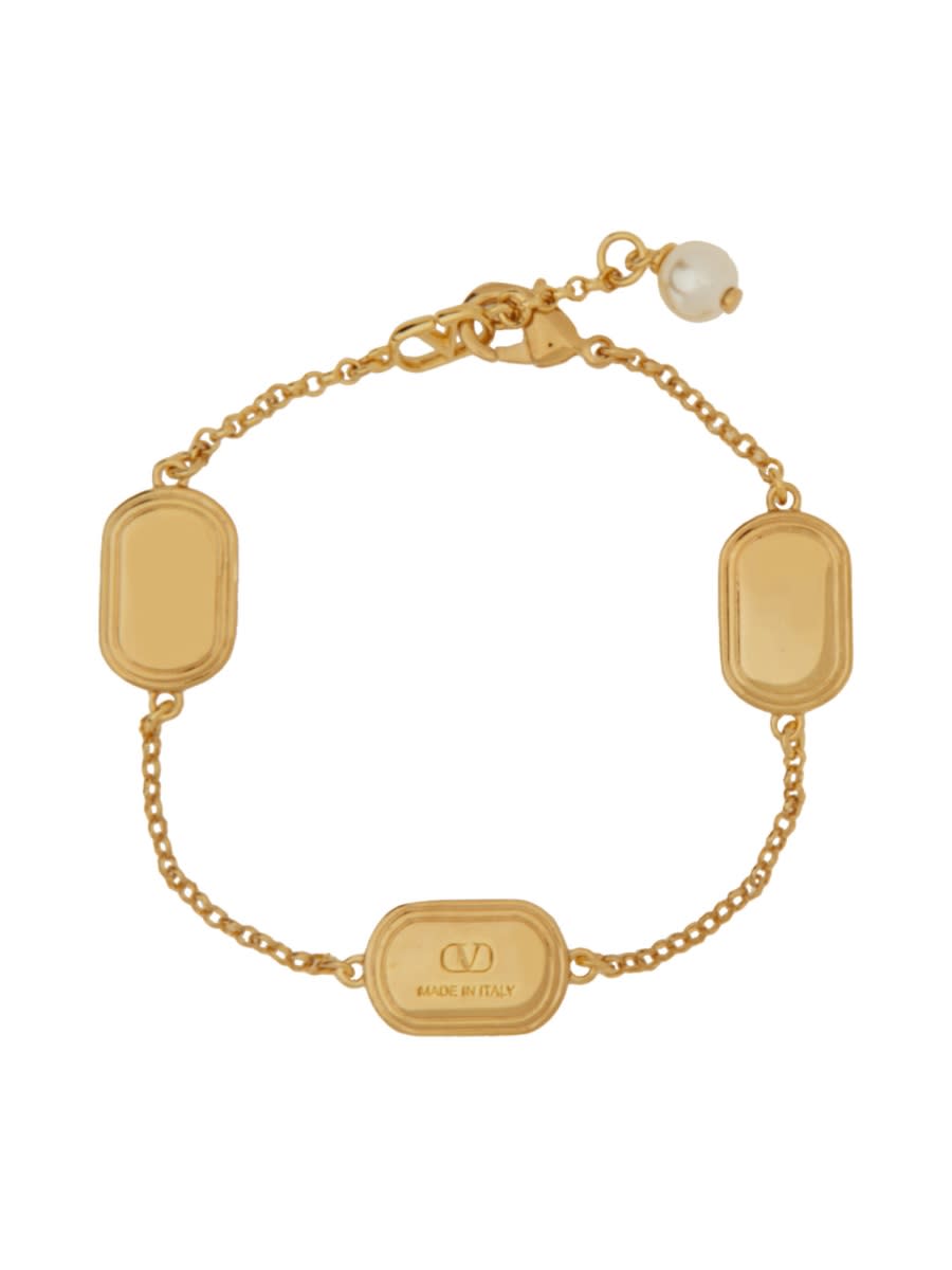 VALENTINO GARAVANI METAL, ENAMEL, CRYSTAL AND SWAROVSKI® PEARL OVALETTE BRACELET