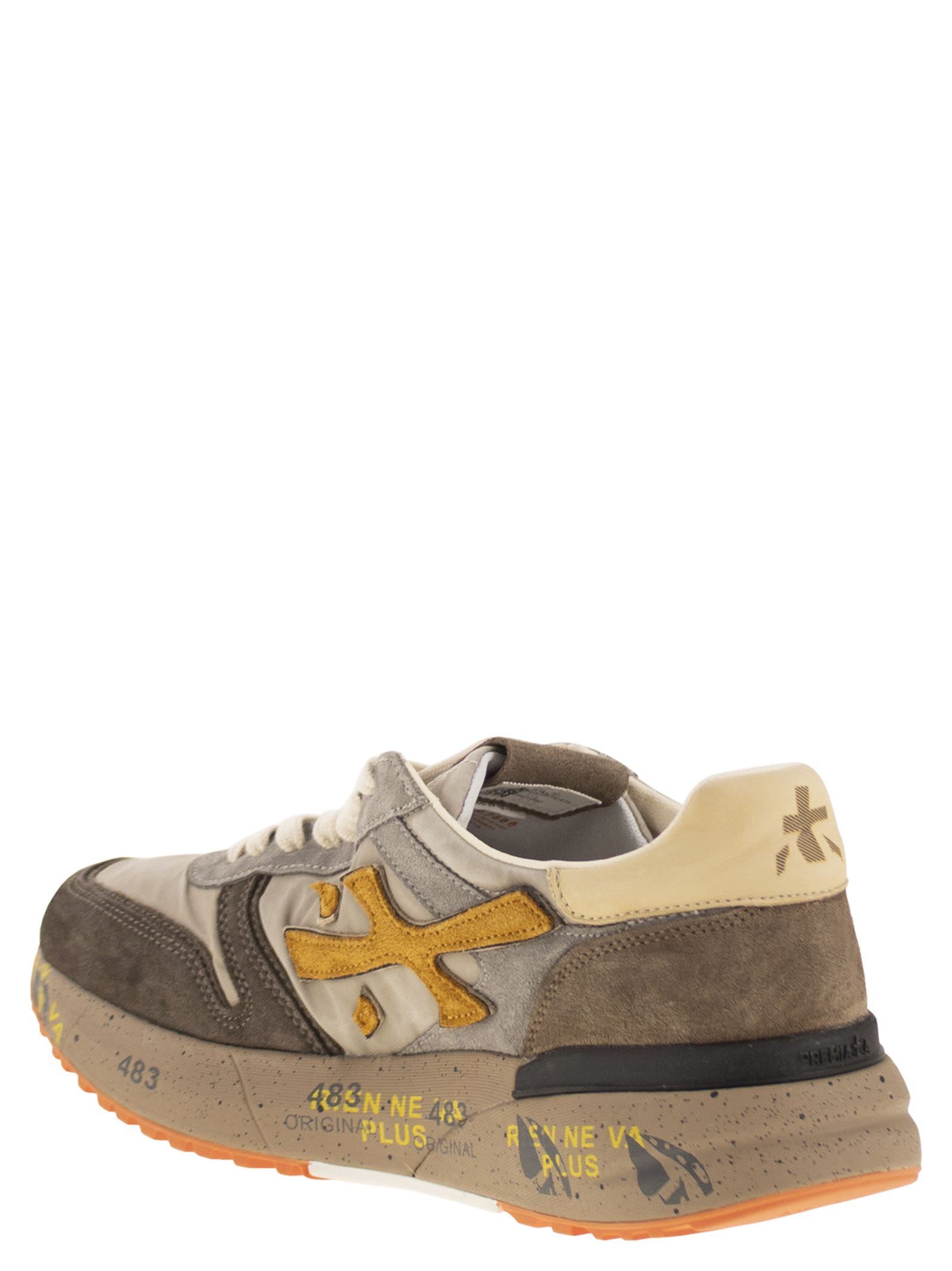 Premiata Sneakers With Contrast Panels And Round Toe In Brown