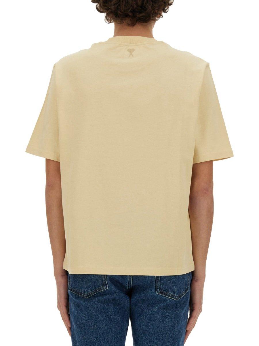 Shop Ami Alexandre Mattiussi Paris Logo Printed Crewneck T-shirt In Yellow