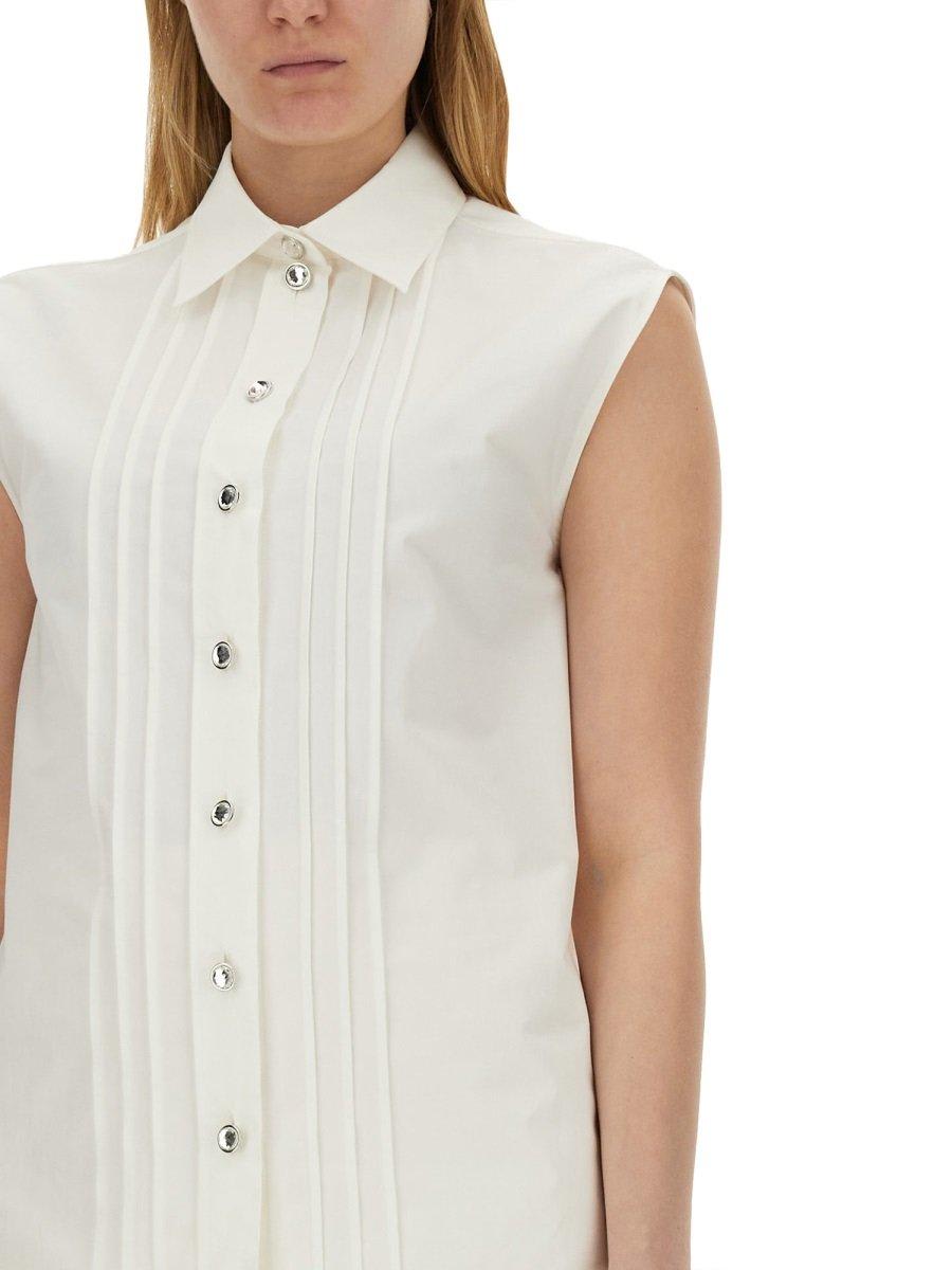 Shop Moschino Pintuck Detailed Curved Hem Shirt In Bianco