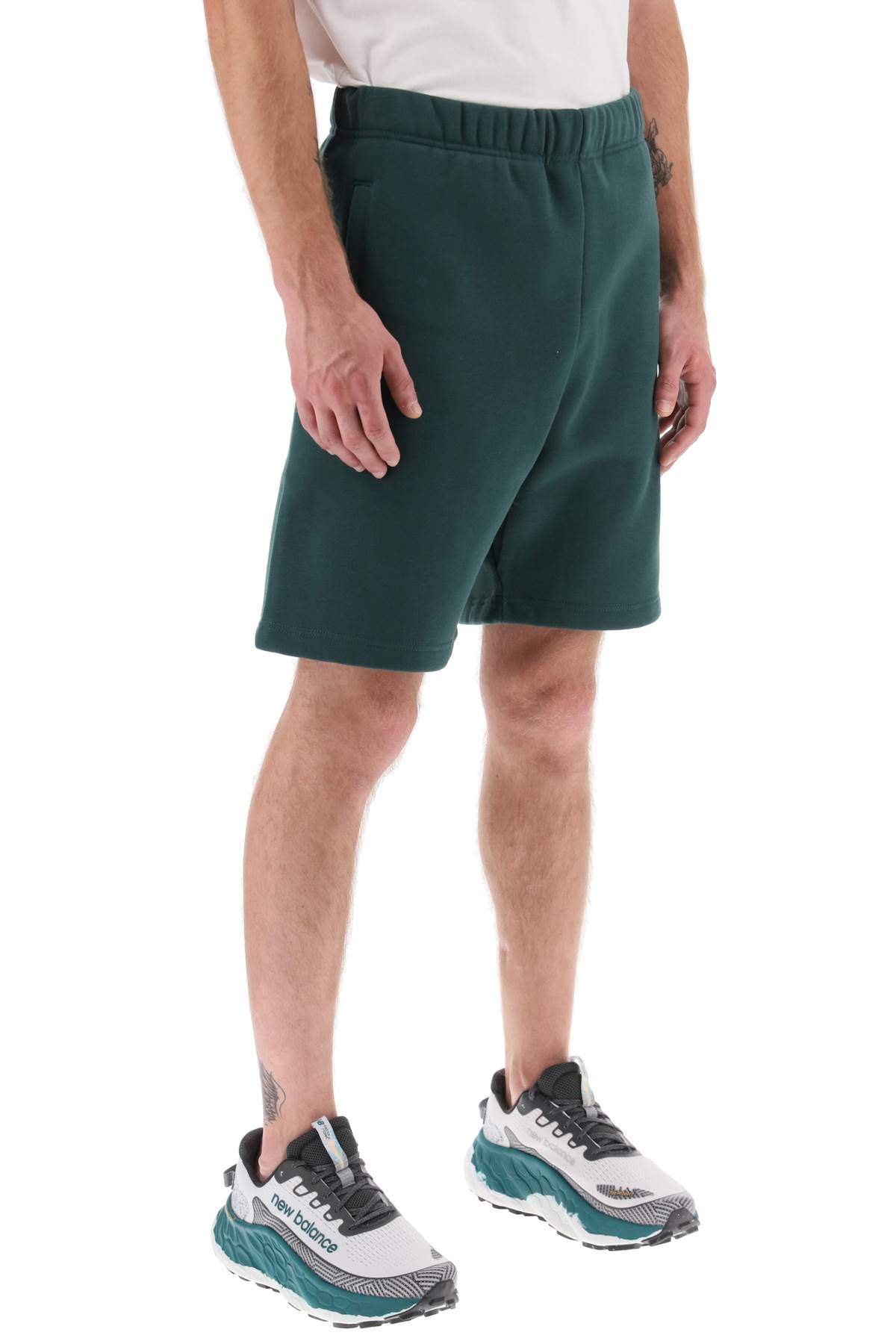 Shop Carhartt Chase Sweat Shorts In Discovery Green Gold (green)