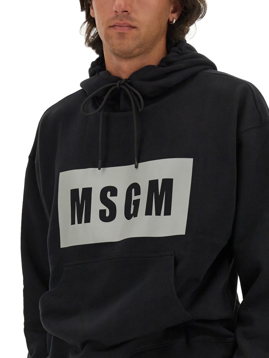 Shop Msgm Logo Printed Drawstring Hoodie In Black