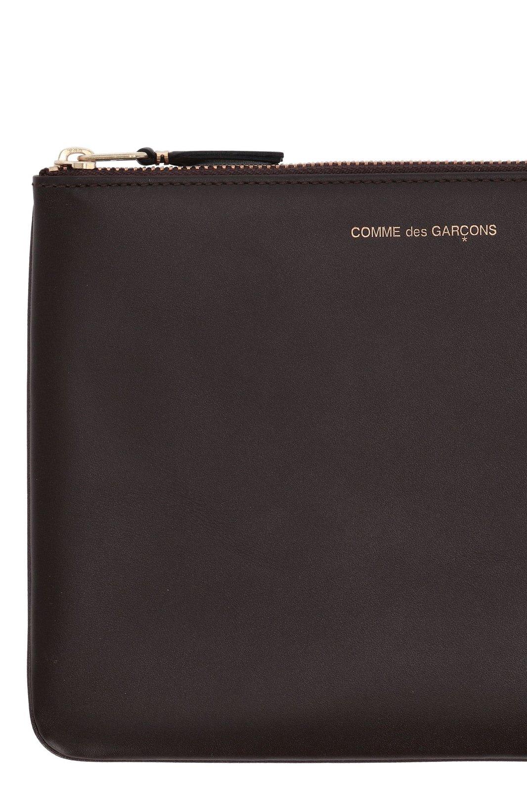 Shop Comme Des Garçons Logo Detailed Zipped Wallet In Brown