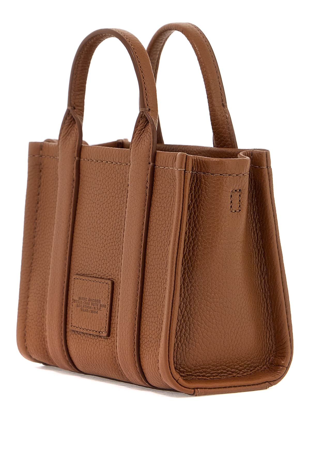 Shop Marc Jacobs The Leather Mini Tote Bag In Argan Oil (brown)