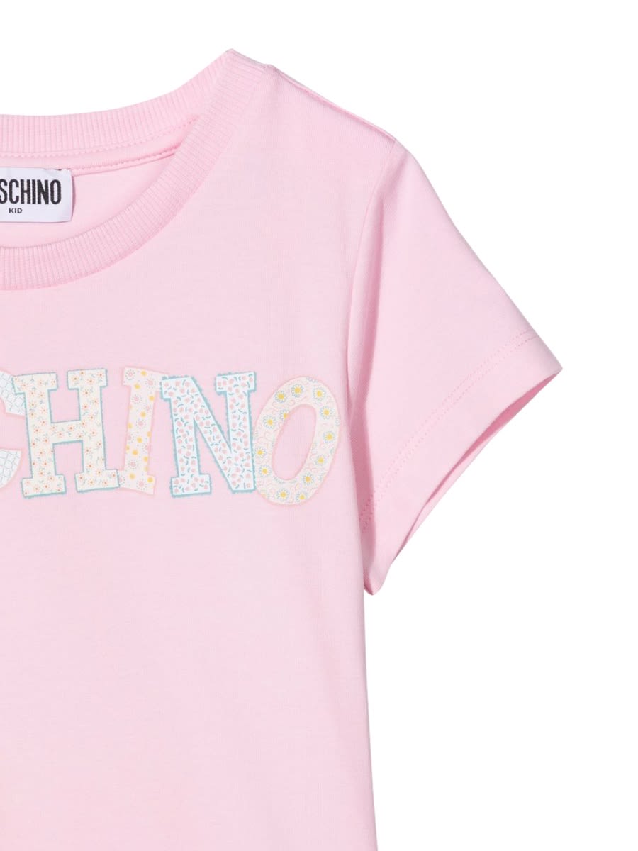 Shop Moschino T-shirt In Pink