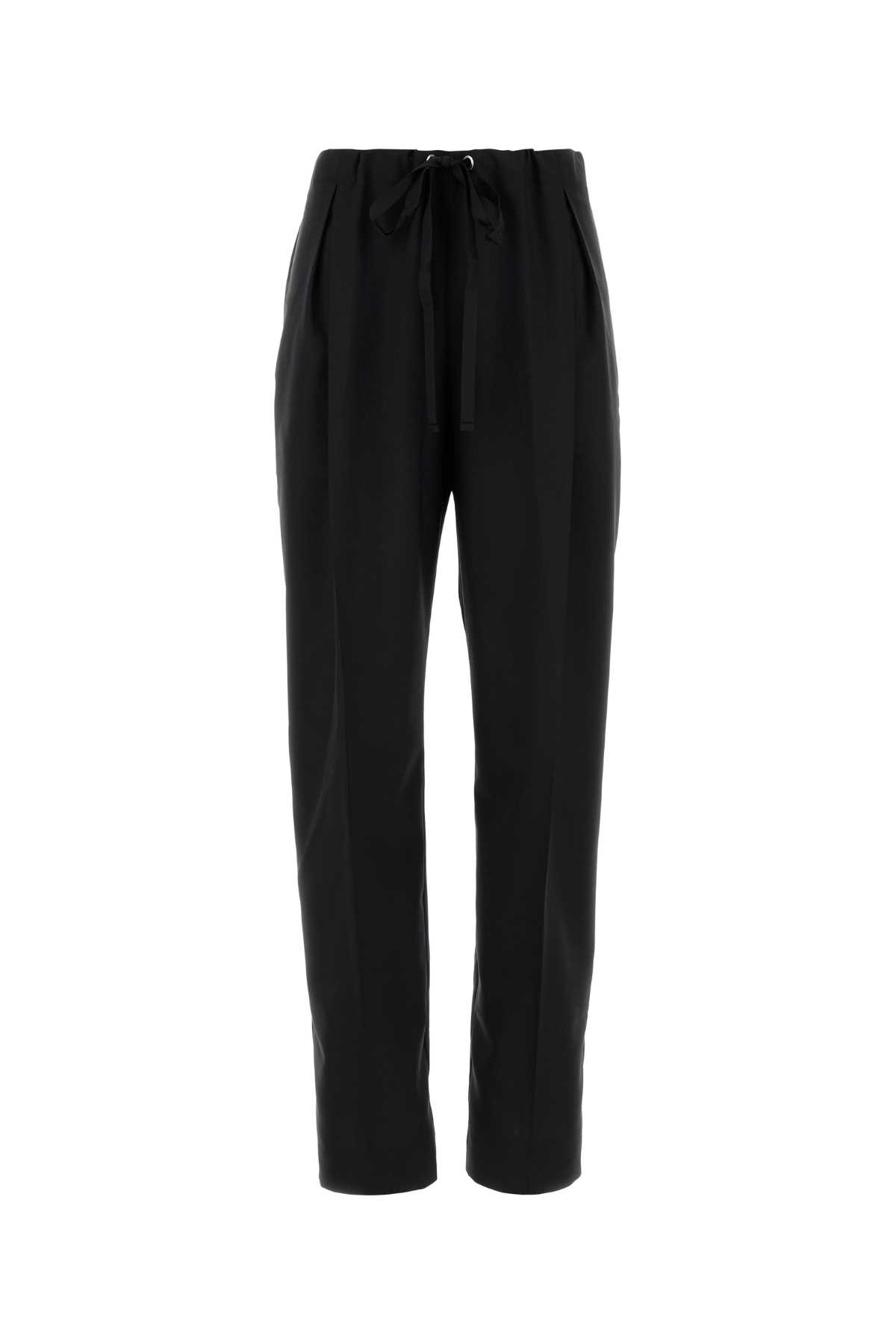 Khaite Cessie Pleated High-waisted Trousers In Black