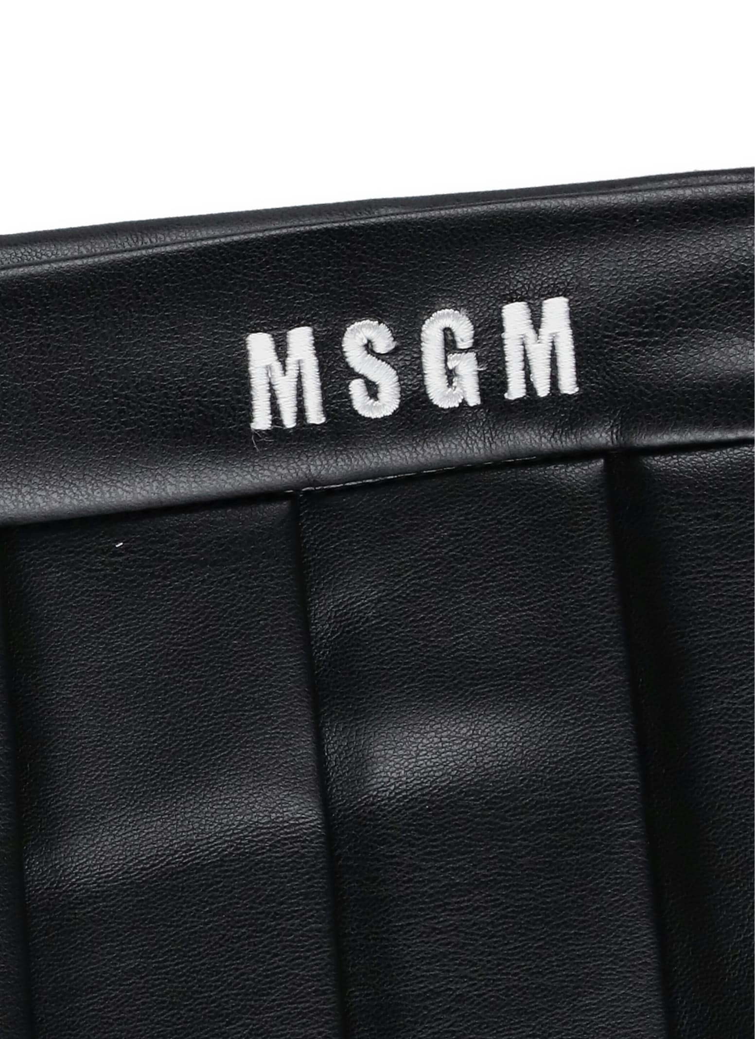 Shop Msgm Synth Leather Skort In Black