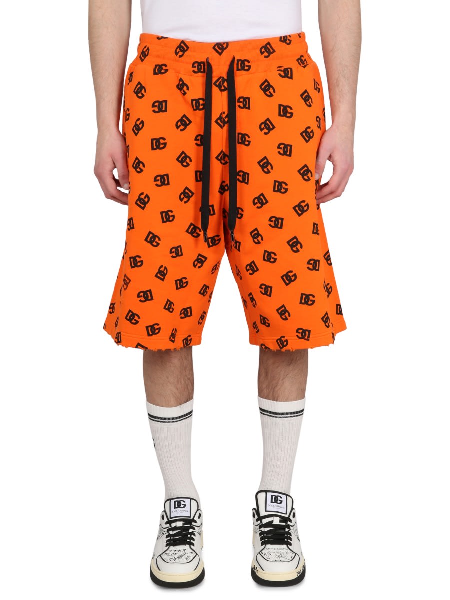 Dolce & Gabbana Logo Waist Drawstring Knee-length Bermuda Shorts In Orange