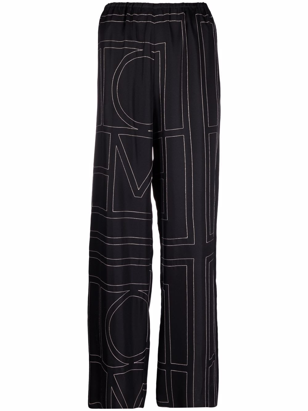 Shop Totême Monogram Silk Pj Bottoms In Black Monogram