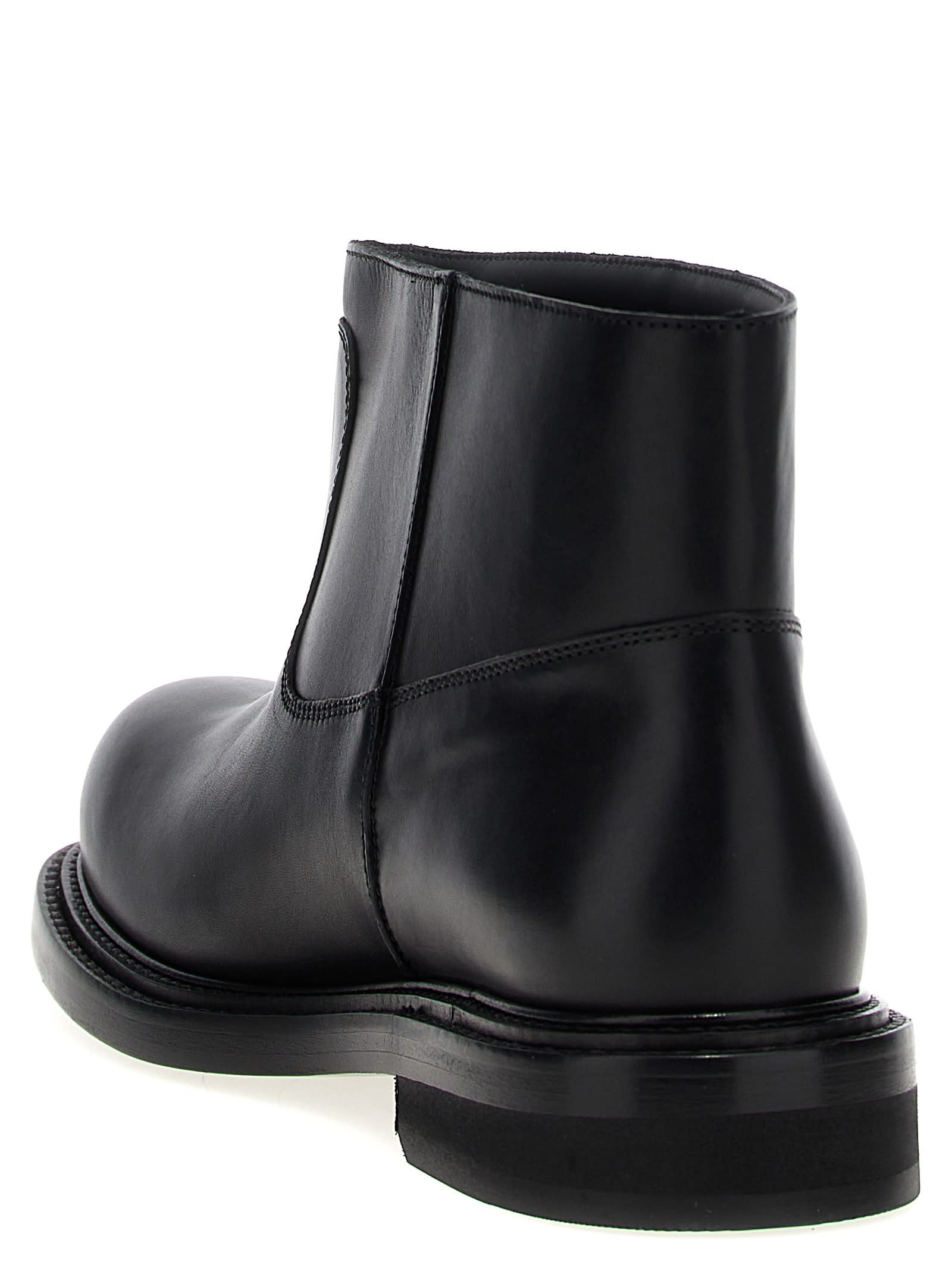 Shop Moschino Clown Ankle Boots In Black