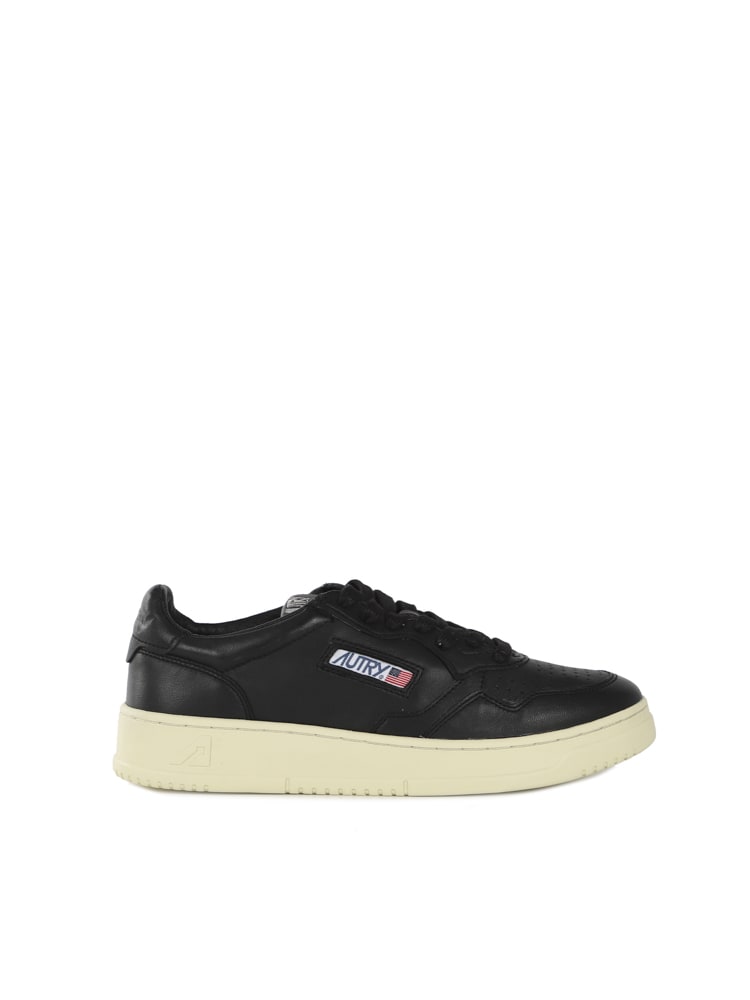 Shop Autry Dallas Low Top Sneakers In Black