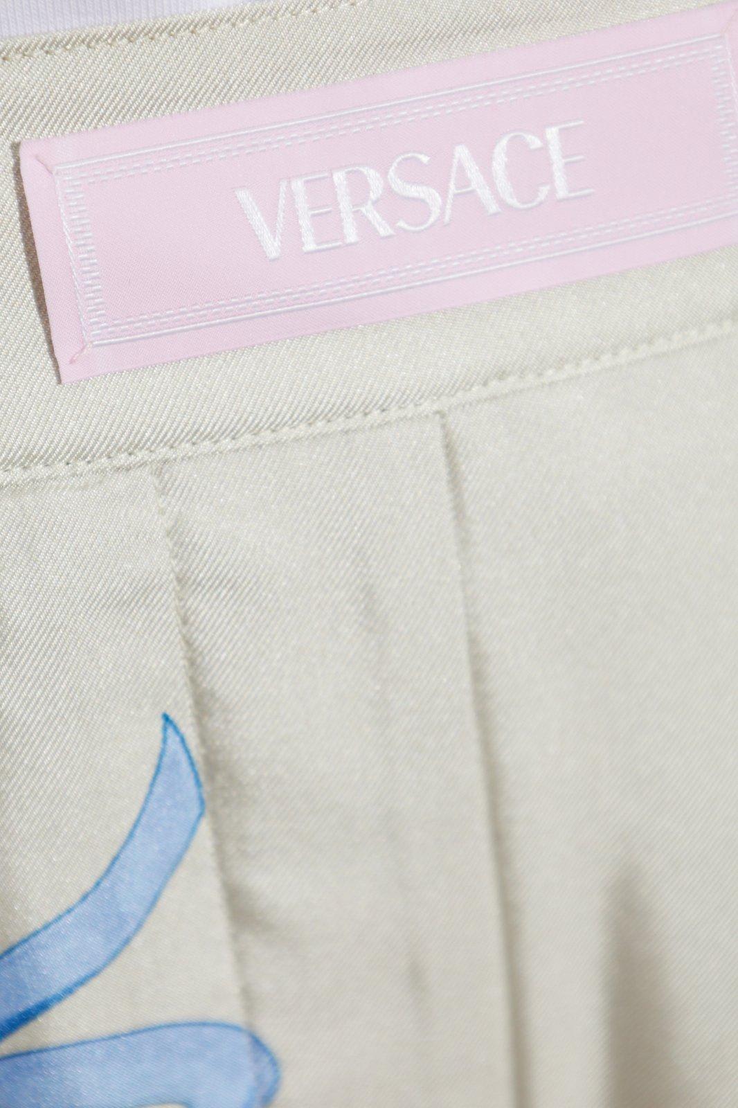 Versace Silk Twill Pajama-style Trousers With Medusa Cameo Print