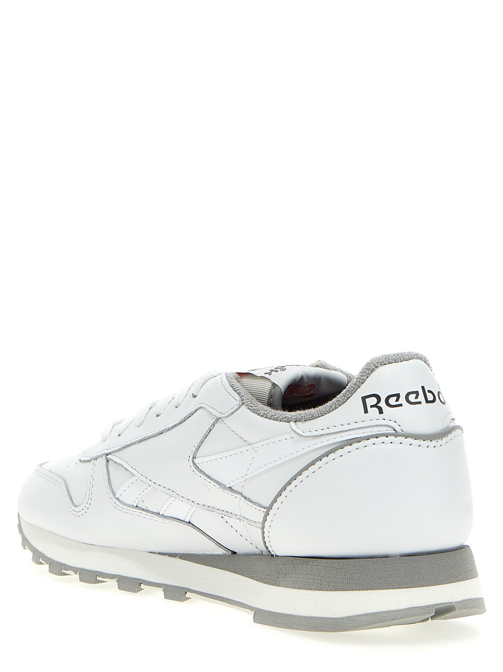Shop Reebok Classic Leather 40 Years Sneakers In White