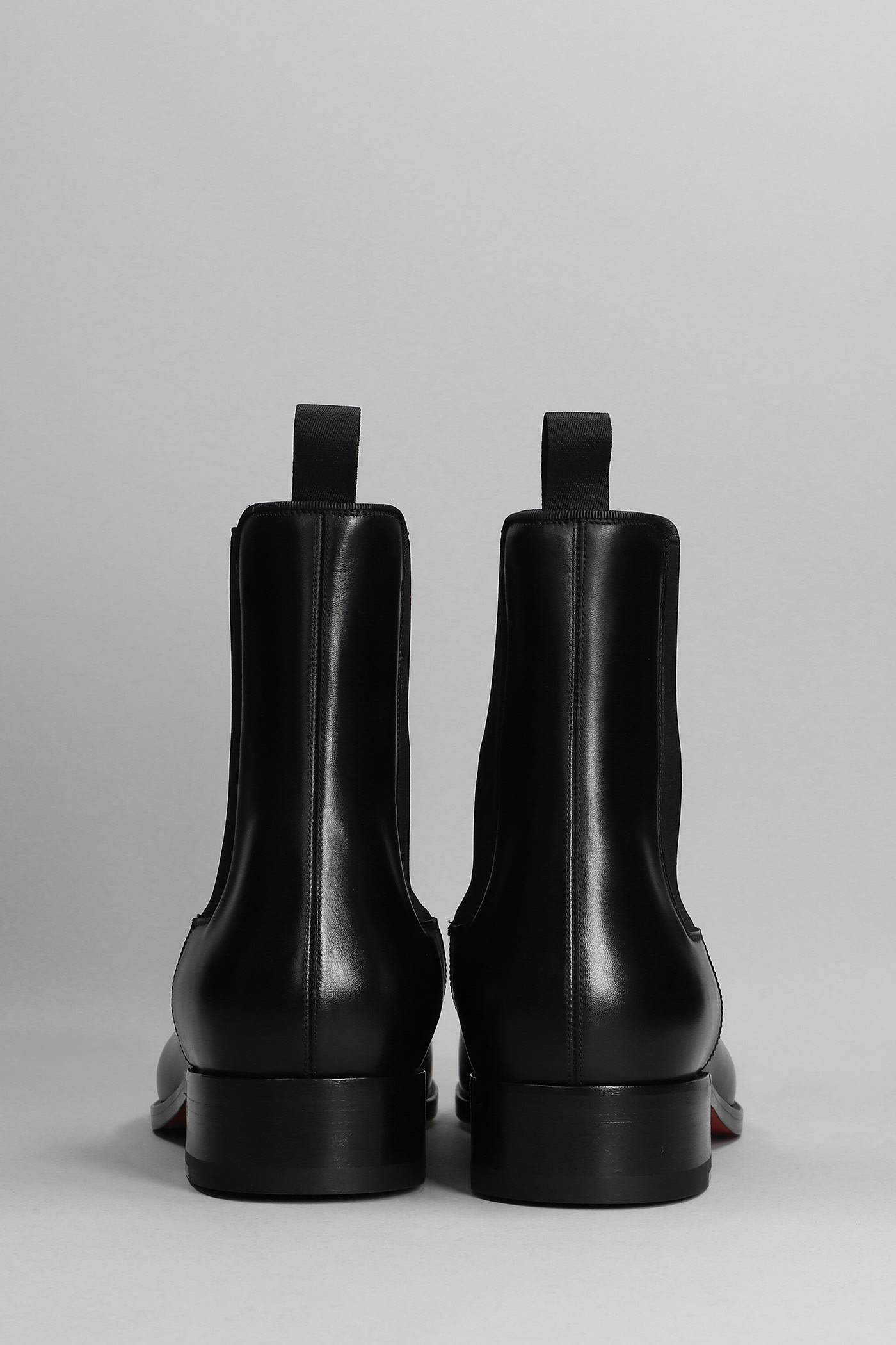 CHRISTIAN LOUBOUTIN SAMSON FLAT ANKLE BOOTS IN BLACK LEATHER